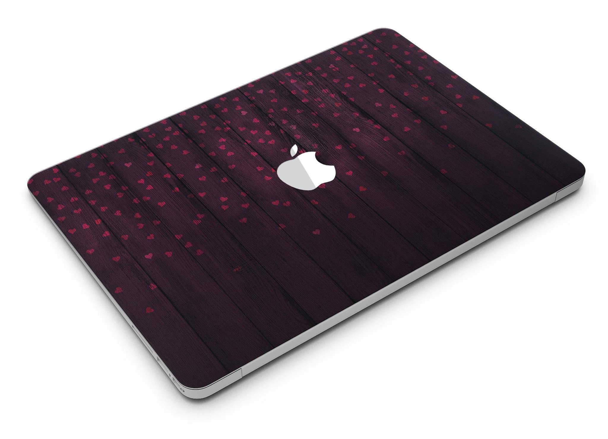 Falling Micro Hearts design on burgundy wood planks MacBook Air skin, showcasing vibrant colors and premium vinyl material.