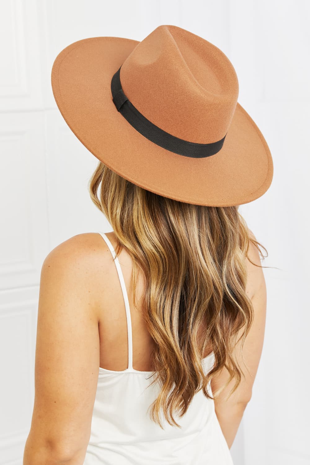 Fame Enjoy The Simple Things Fedora Hat in tan with black ribbon band, showcasing its stylish design and adjustable fit.