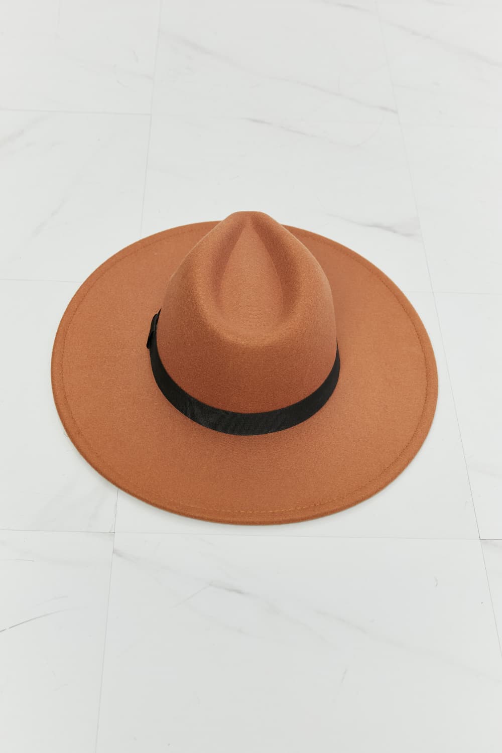 Fame Enjoy The Simple Things Fedora Hat in tan with black ribbon band, showcasing its stylish design and adjustable fit.