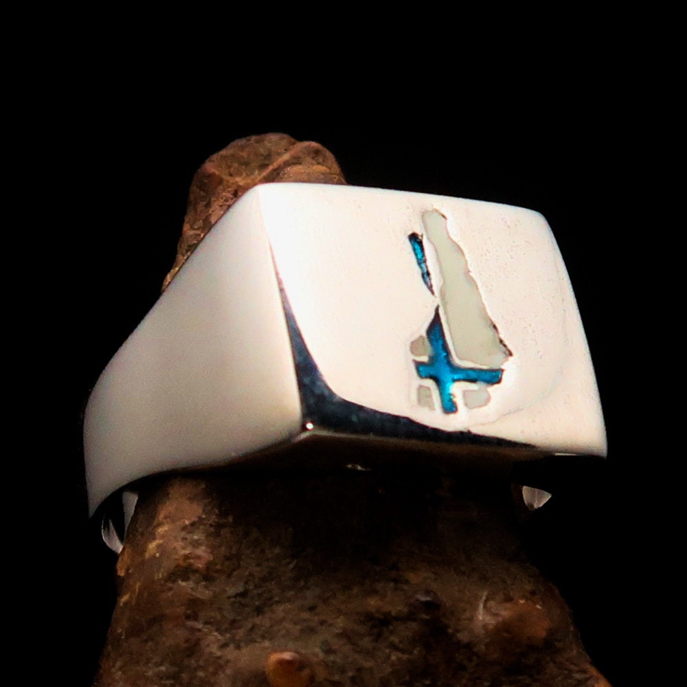 A stunning sterling silver pinky ring featuring the Flag of Finland, polished to a mirror finish with the RCRN Logo.