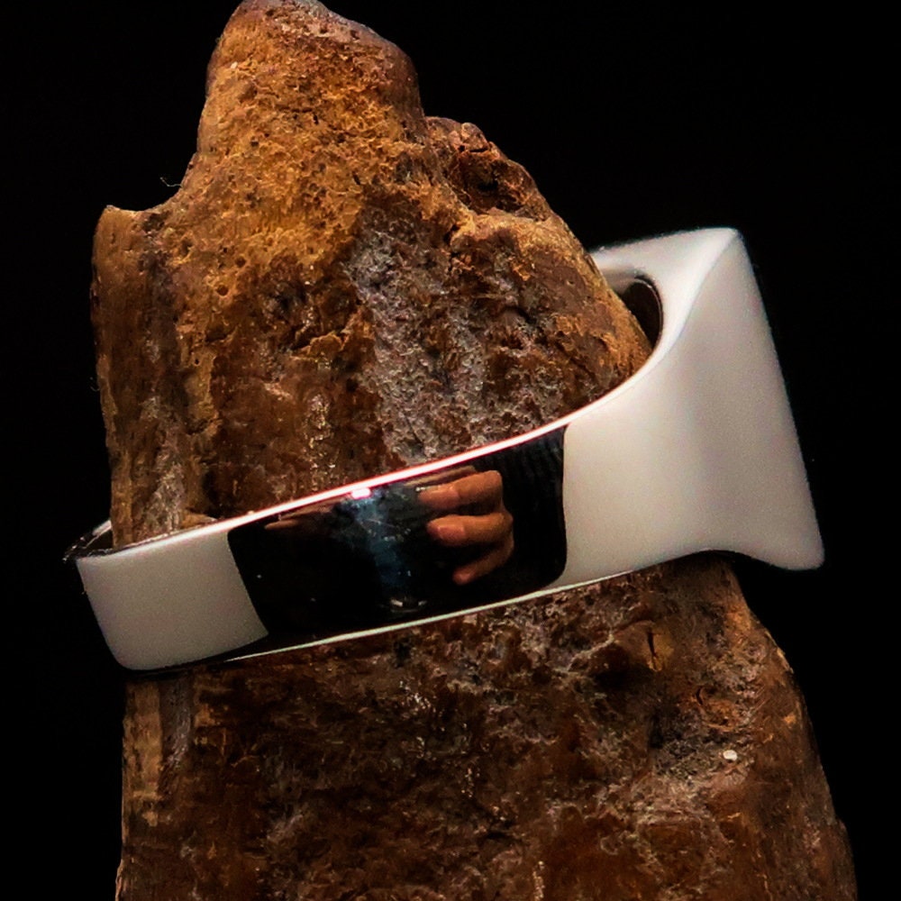 A stunning sterling silver pinky ring featuring the Flag of Finland, polished to a mirror finish with the RCRN Logo.