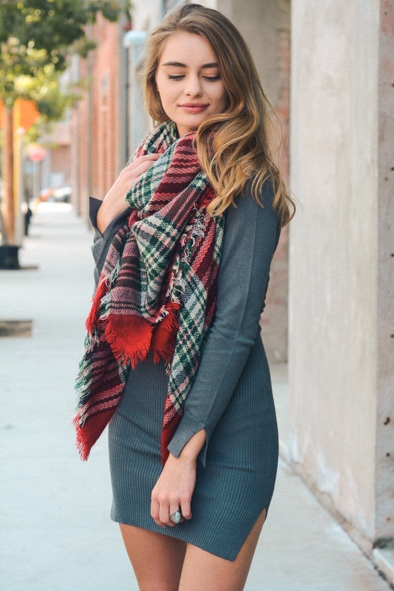 A cozy Flannel Frayed Edge Blanket Scarf in a stylish design, showcasing its soft texture and frayed edges.