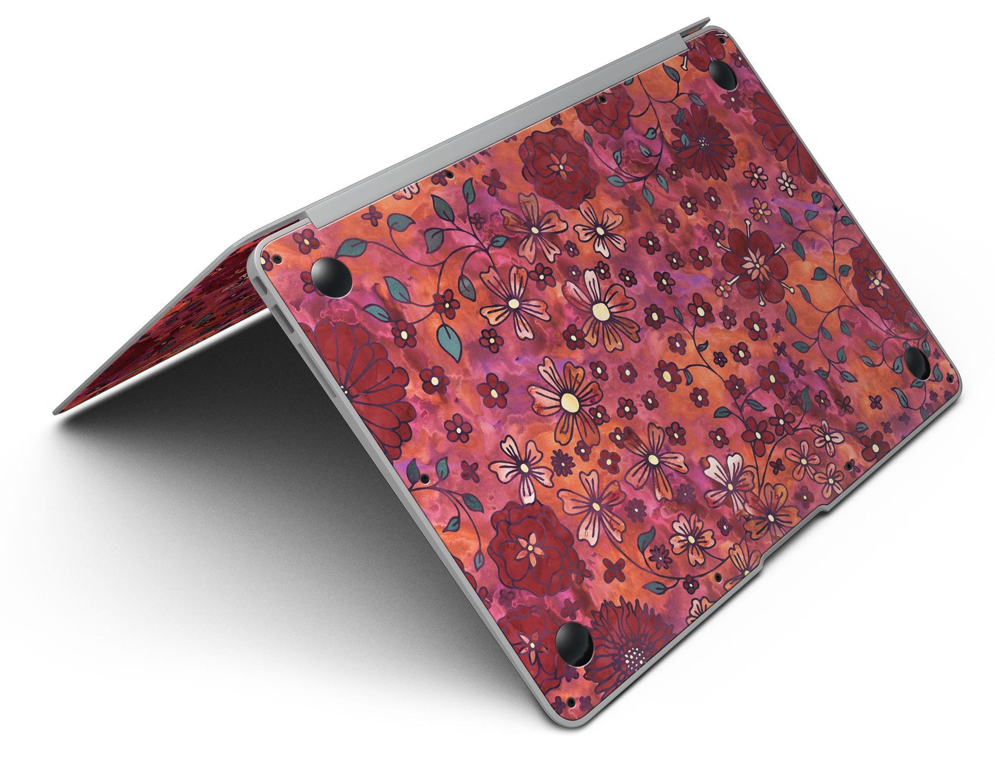 Floral Pattern on Red Watercolor MacBook Air Skin Kit showcasing vibrant floral designs on a red background.