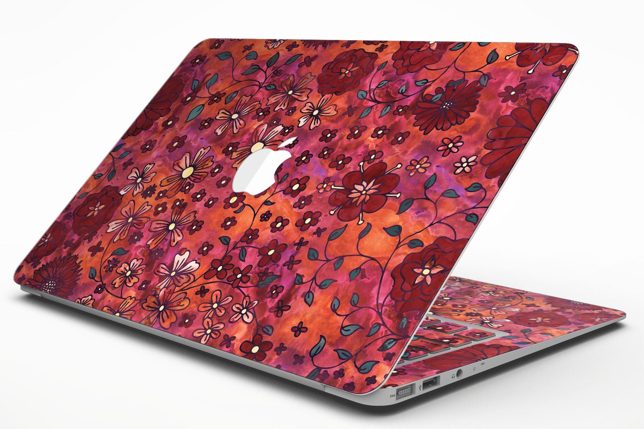 Floral Pattern on Red Watercolor MacBook Air Skin Kit showcasing vibrant floral designs on a red background.