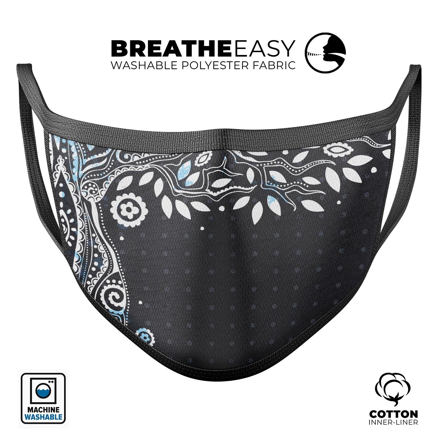 Flourish Black and White Tree mouth cover, showcasing a stylish design with adjustable ear loops, made from soft cotton and memory foam.