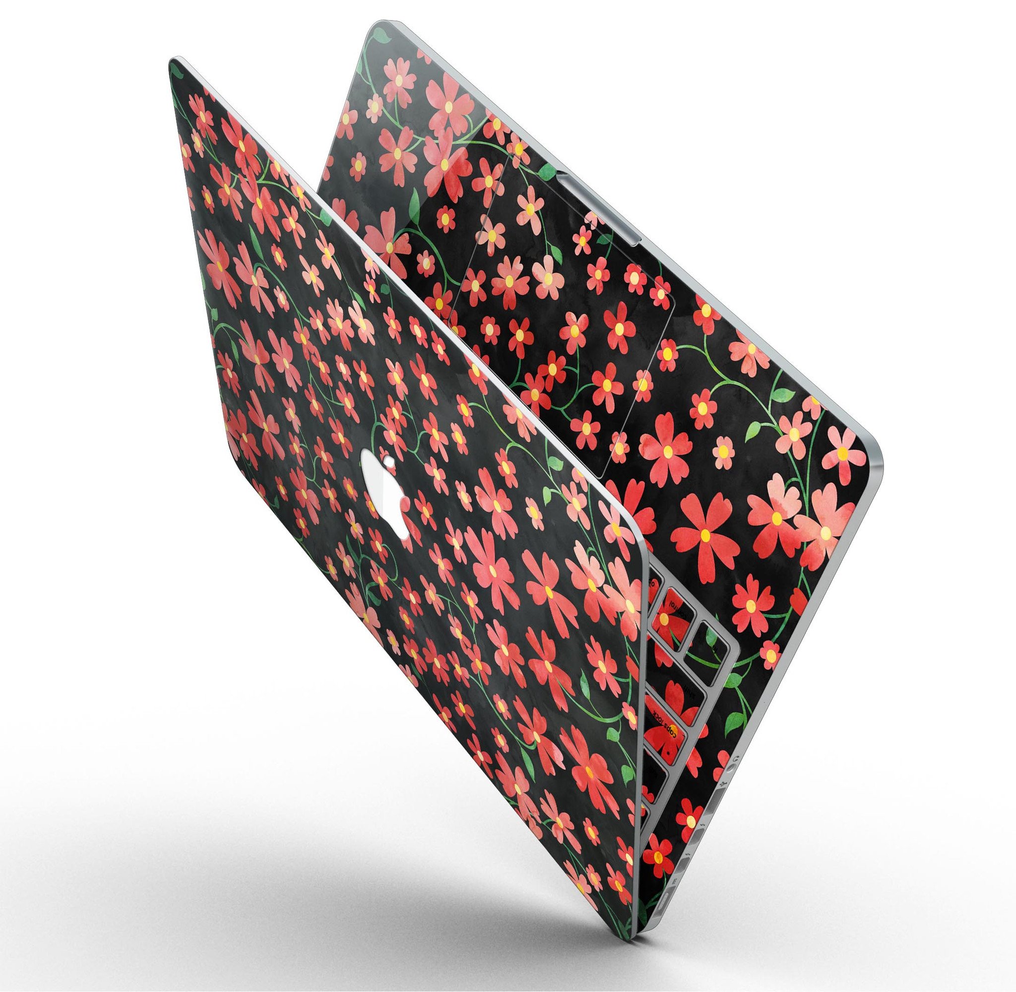 A MacBook Pro with Retina Display featuring a vibrant Flowers with Stems design skin, showcasing floral patterns over a black watercolor background.