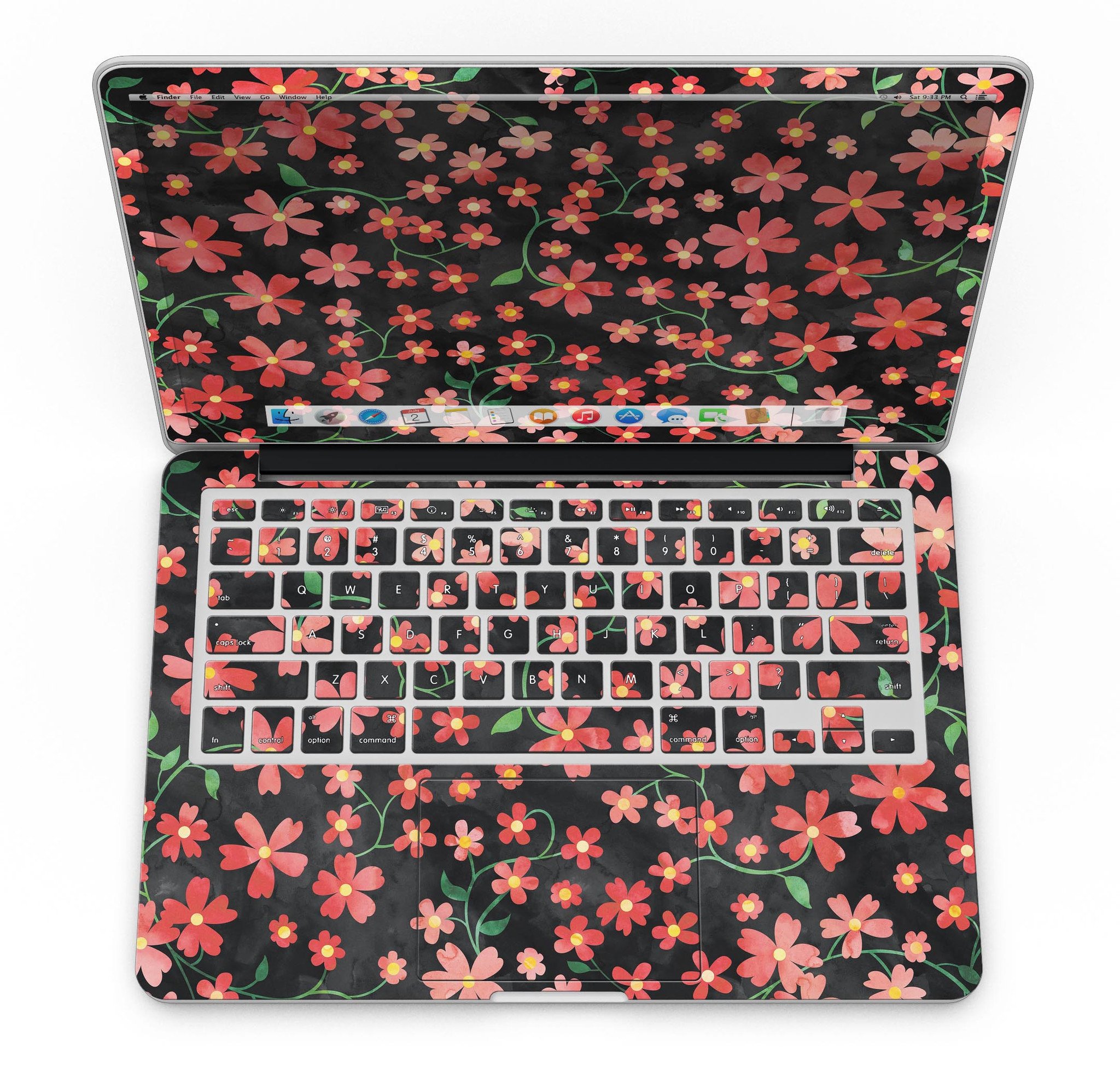 A MacBook Pro with Retina Display featuring a vibrant Flowers with Stems design skin, showcasing floral patterns over a black watercolor background.
