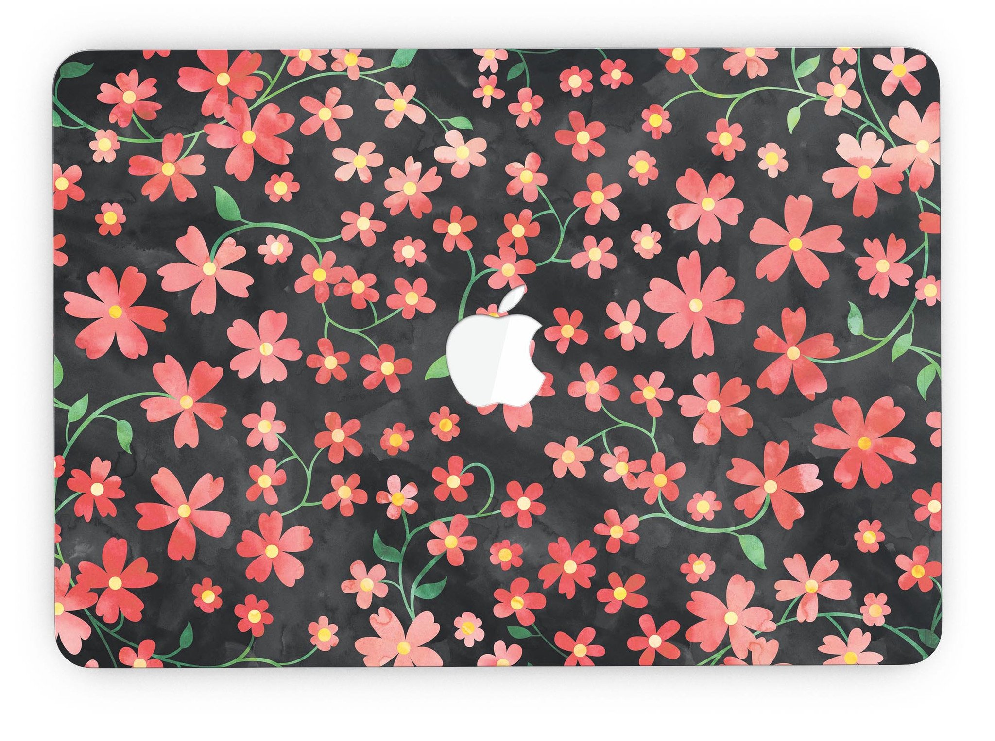 A MacBook Pro with Retina Display featuring a vibrant Flowers with Stems design skin, showcasing floral patterns over a black watercolor background.