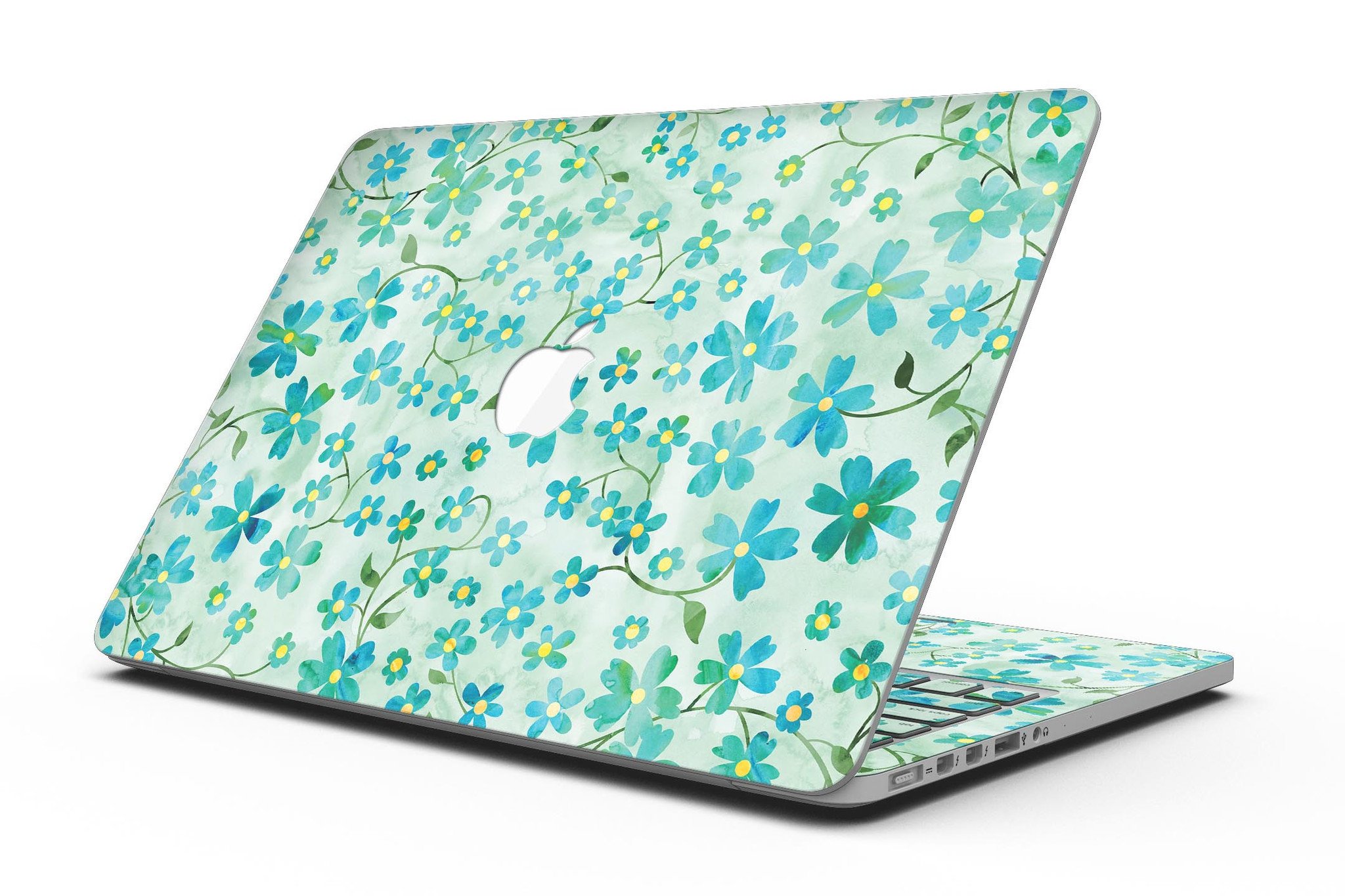 A MacBook Pro with a floral skin featuring flowers and stems over a light green watercolor background, showcasing its stylish design.