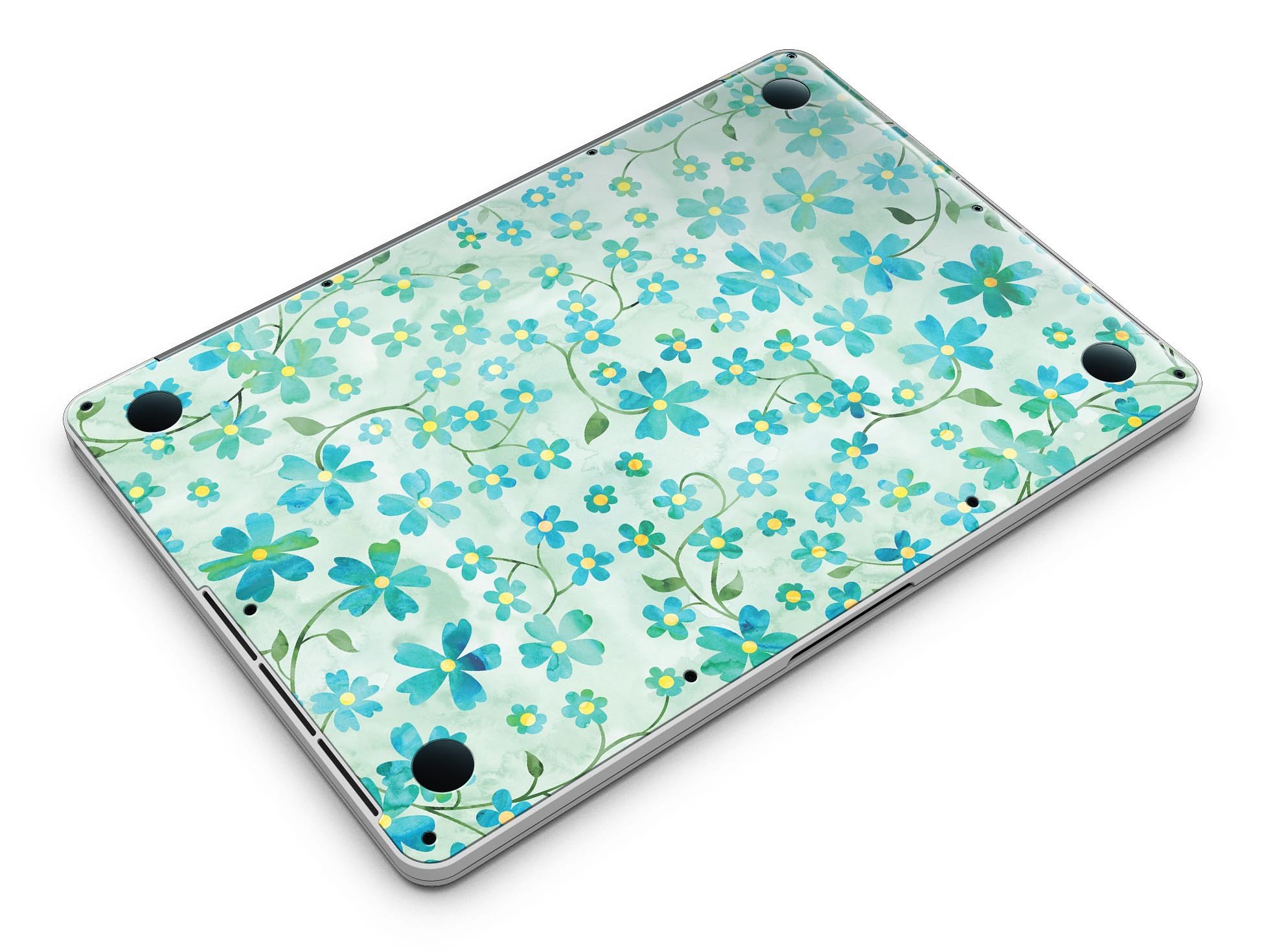 A MacBook Pro with a floral skin featuring flowers and stems over a light green watercolor background, showcasing its stylish design.