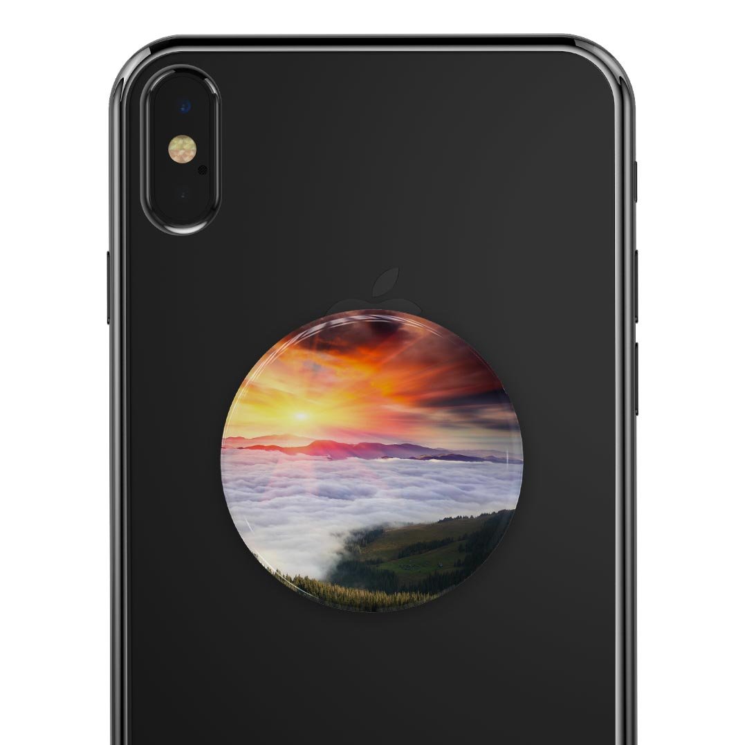 Foggy Mountainside Skin Kit for PopSockets, featuring a scenic mountain design on premium vinyl, showcasing its glossy finish.