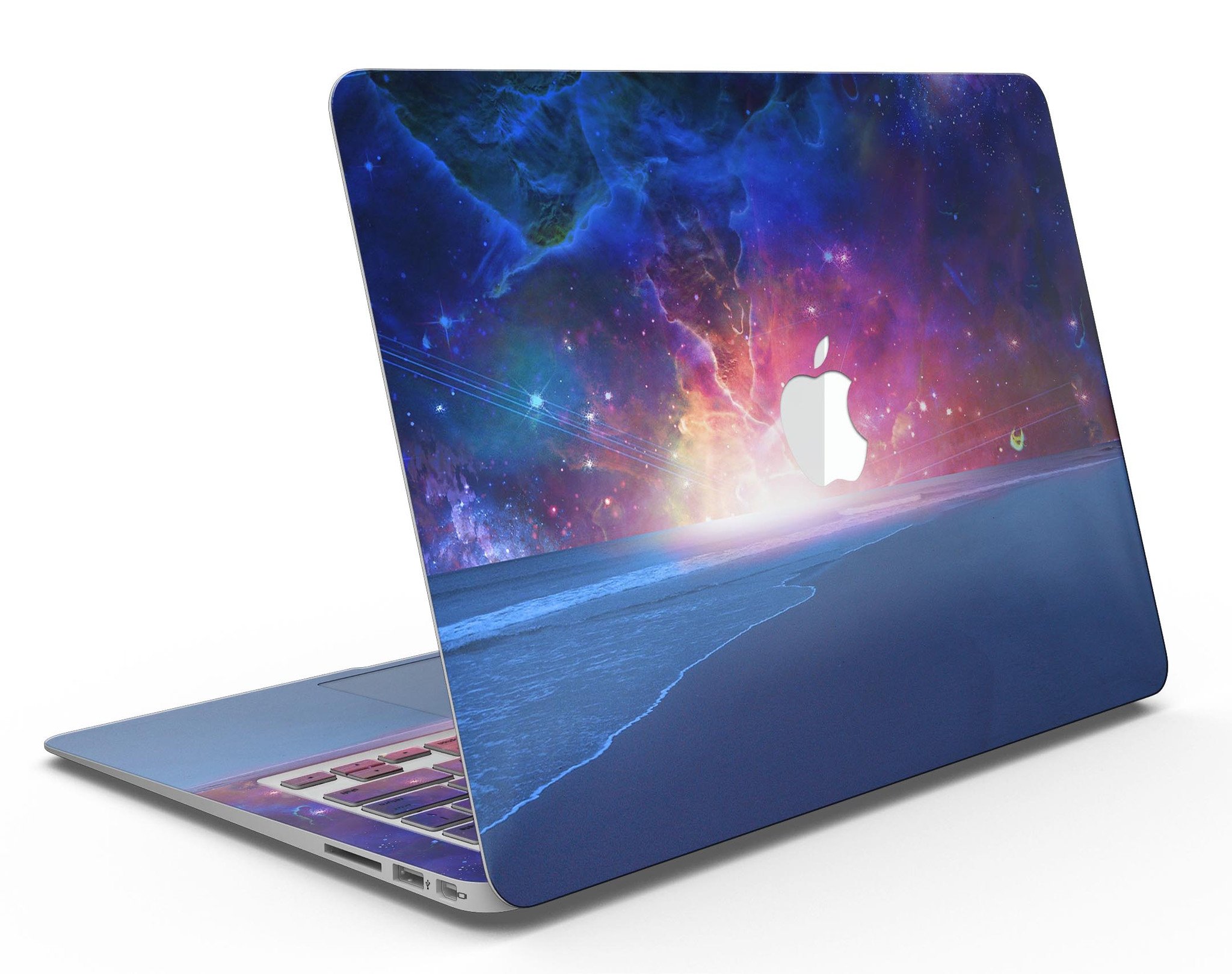 Galaxy Explosion design skin kit for MacBook Air, showcasing vibrant colors and patterns over a calm sea shore.