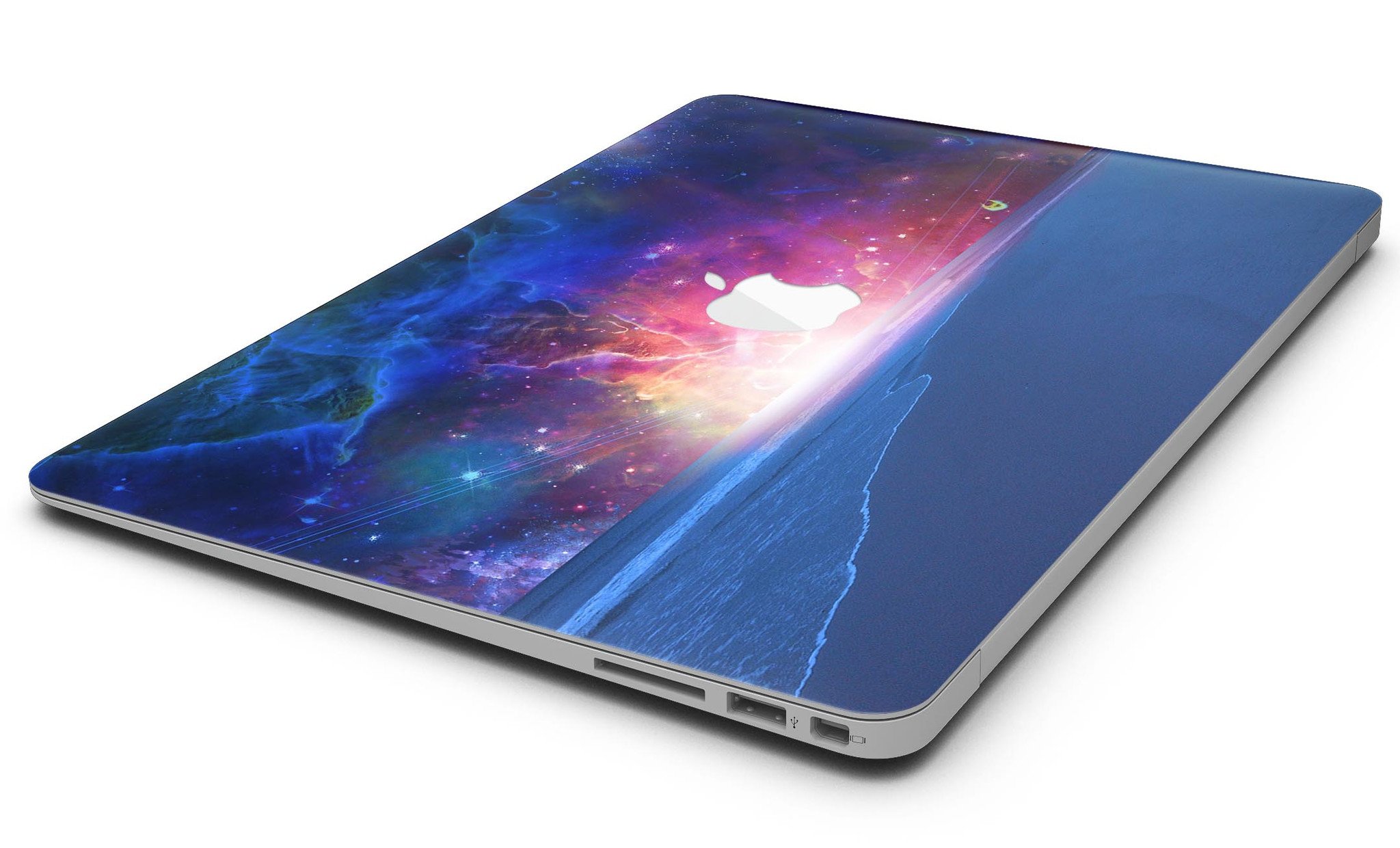 Galaxy Explosion design skin kit for MacBook Air, showcasing vibrant colors and patterns over a calm sea shore.