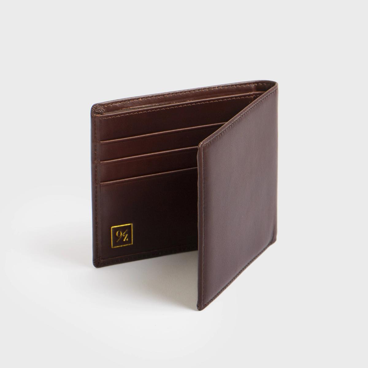 Genuine Leather Men’s Luxury Bi-Fold Wallet showcasing its elegant design and multiple pockets.