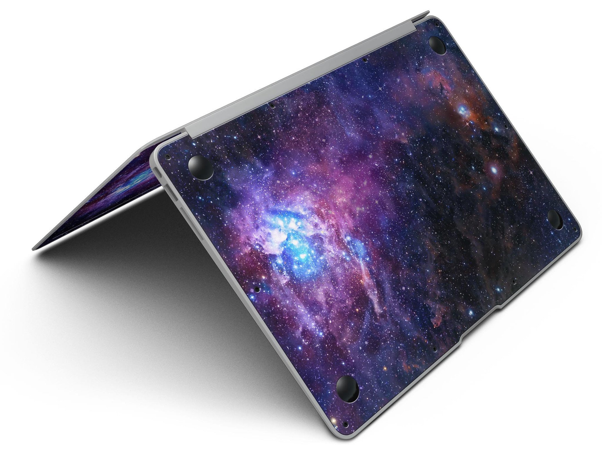 Glowing Deep Space MacBook Air Skin Kit showcasing vibrant cosmic design on a sleek MacBook Air.