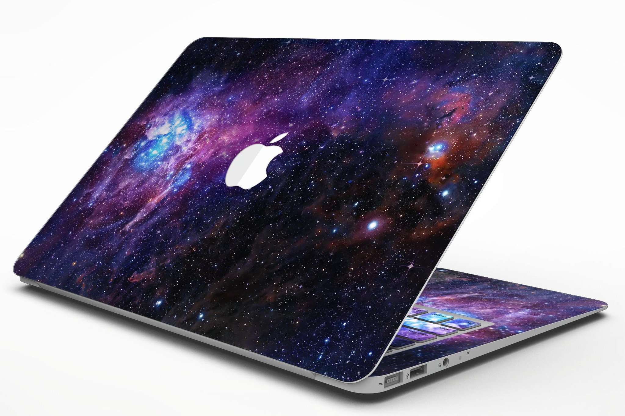 Glowing Deep Space MacBook Air Skin Kit showcasing vibrant cosmic design on a sleek MacBook Air.