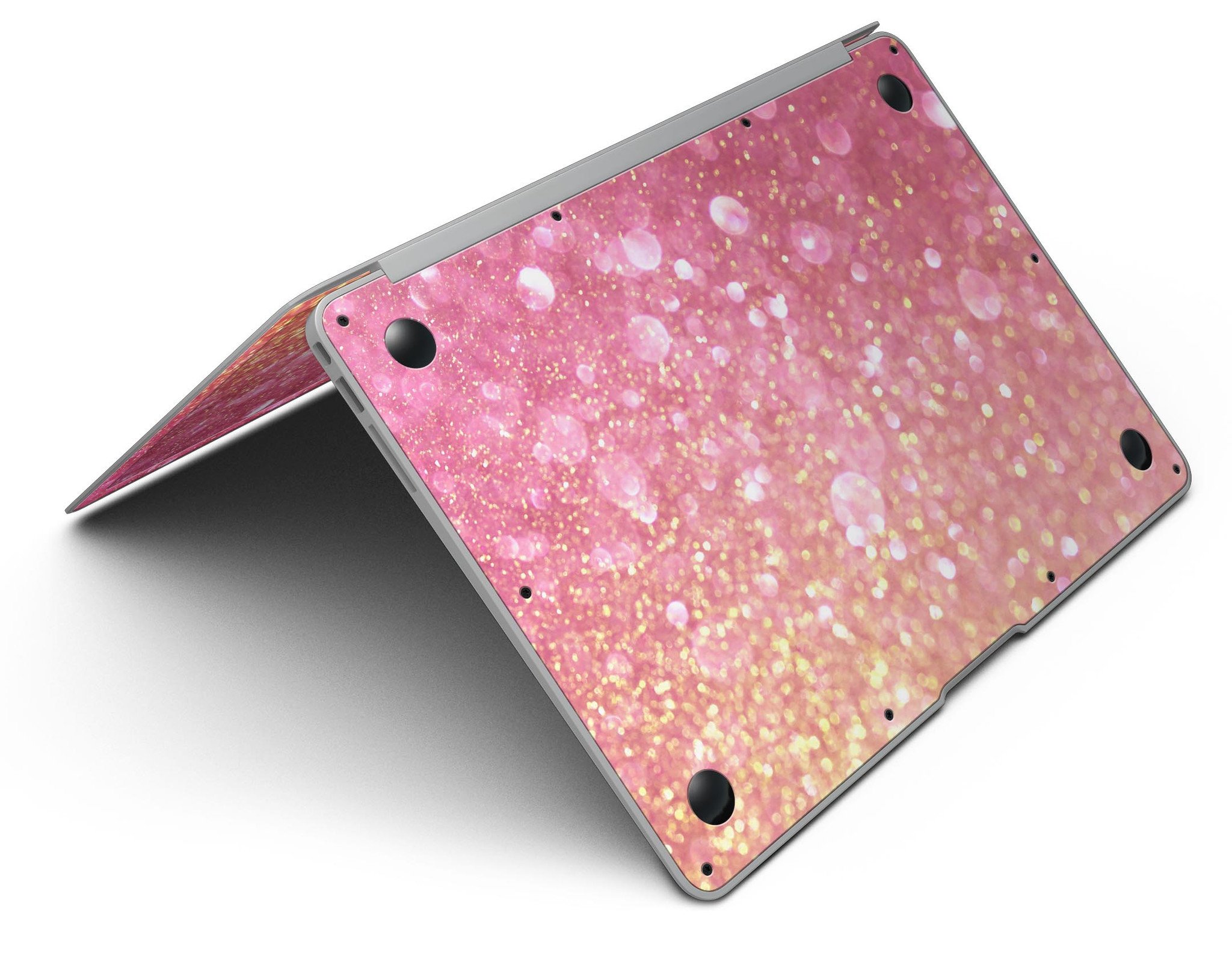 Glowing Pink and Gold Orbs of Light skin kit for MacBook Air, showcasing vibrant colors and a sleek design.