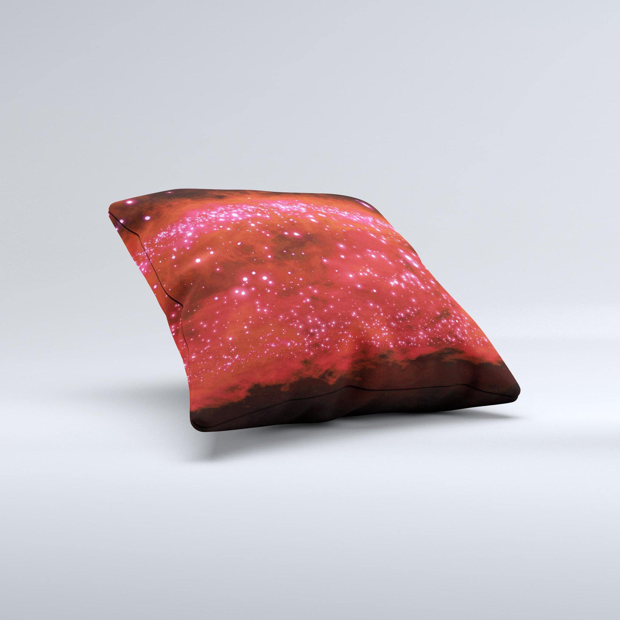 A decorative throw pillow featuring glowing red orbs of light on a soft fabric background, handcrafted in Virginia.