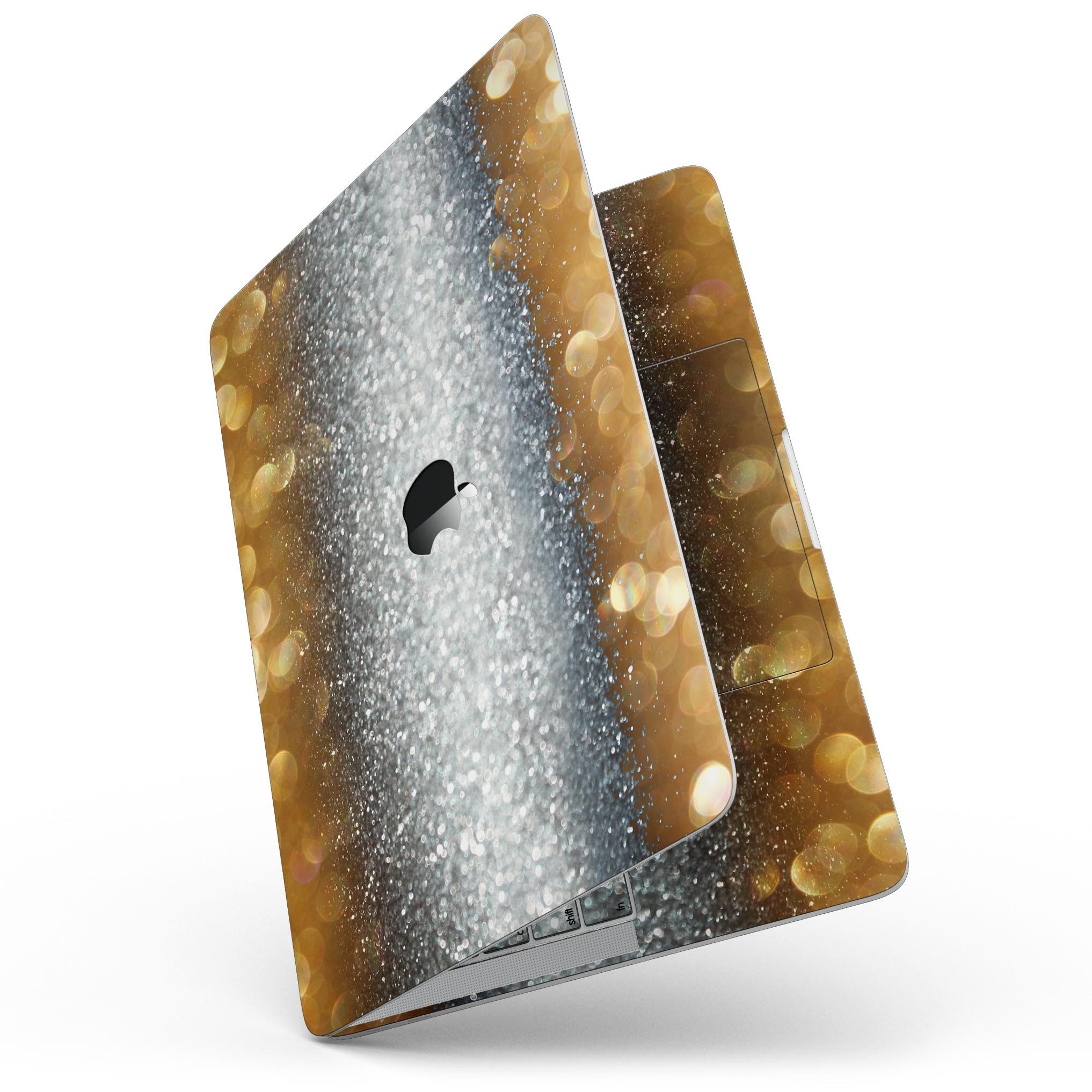 Gold and Silver Unfocused Orbs of Glowing Light skin applied to a MacBook Pro, showcasing its vibrant design and sleek finish.