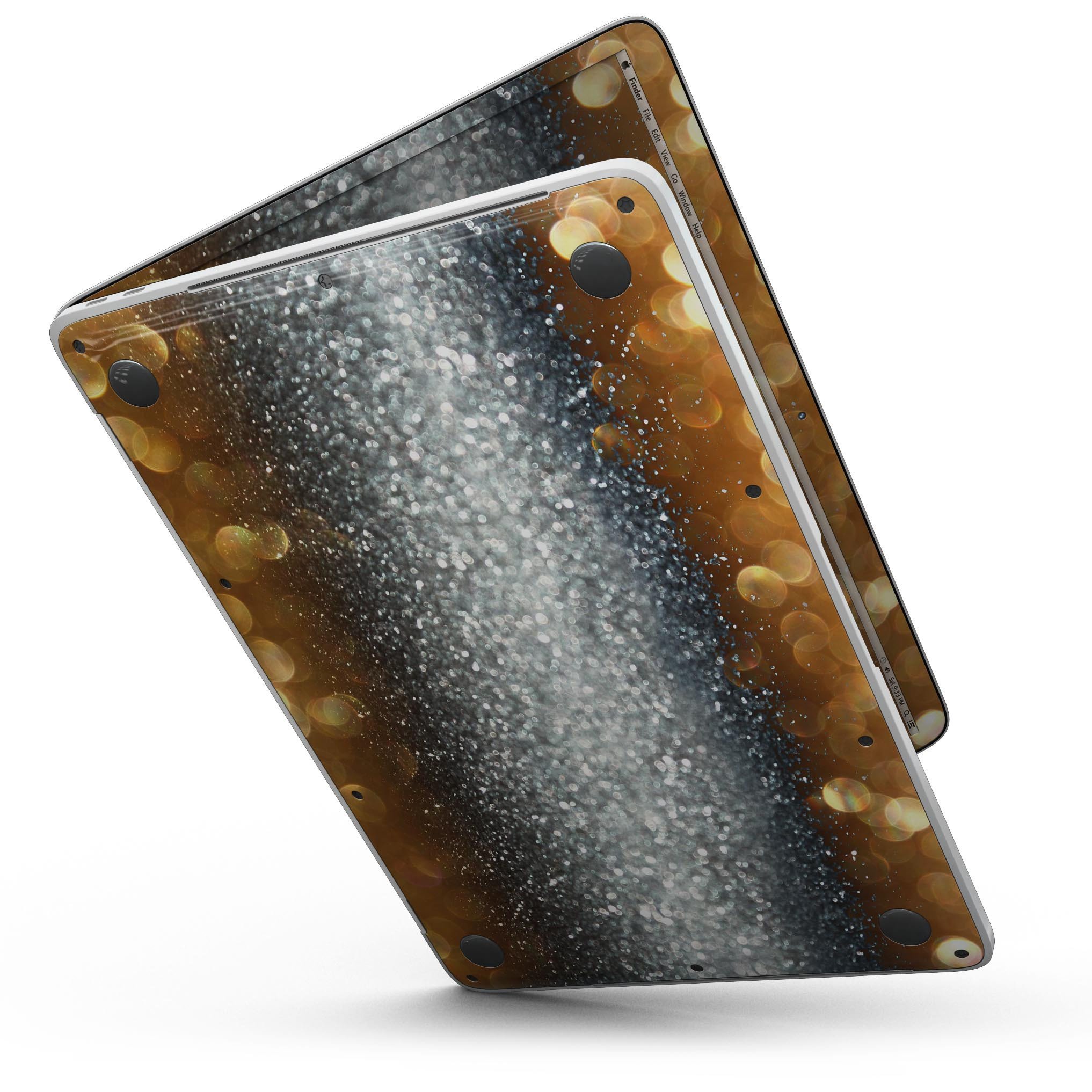 Gold and Silver Unfocused Orbs of Glowing Light skin applied to a MacBook Pro, showcasing its vibrant design and sleek finish.