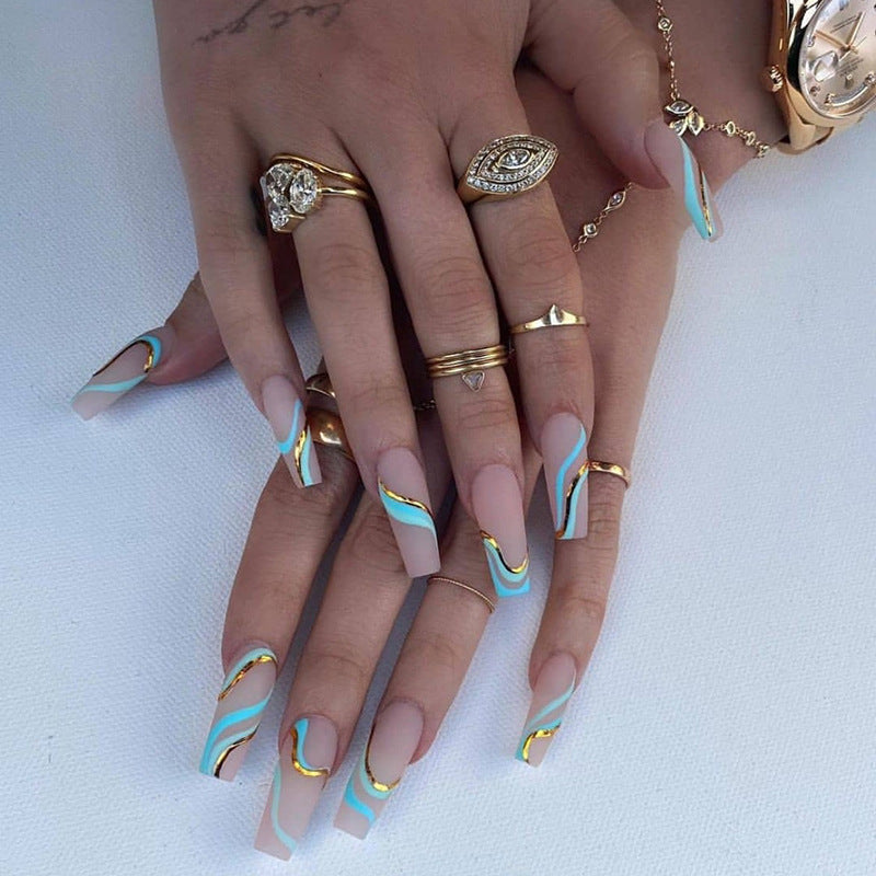 Gold Line Wave Pattern Long Ballet Nails displayed in a stylish arrangement, showcasing their elegant design and frosted finish.