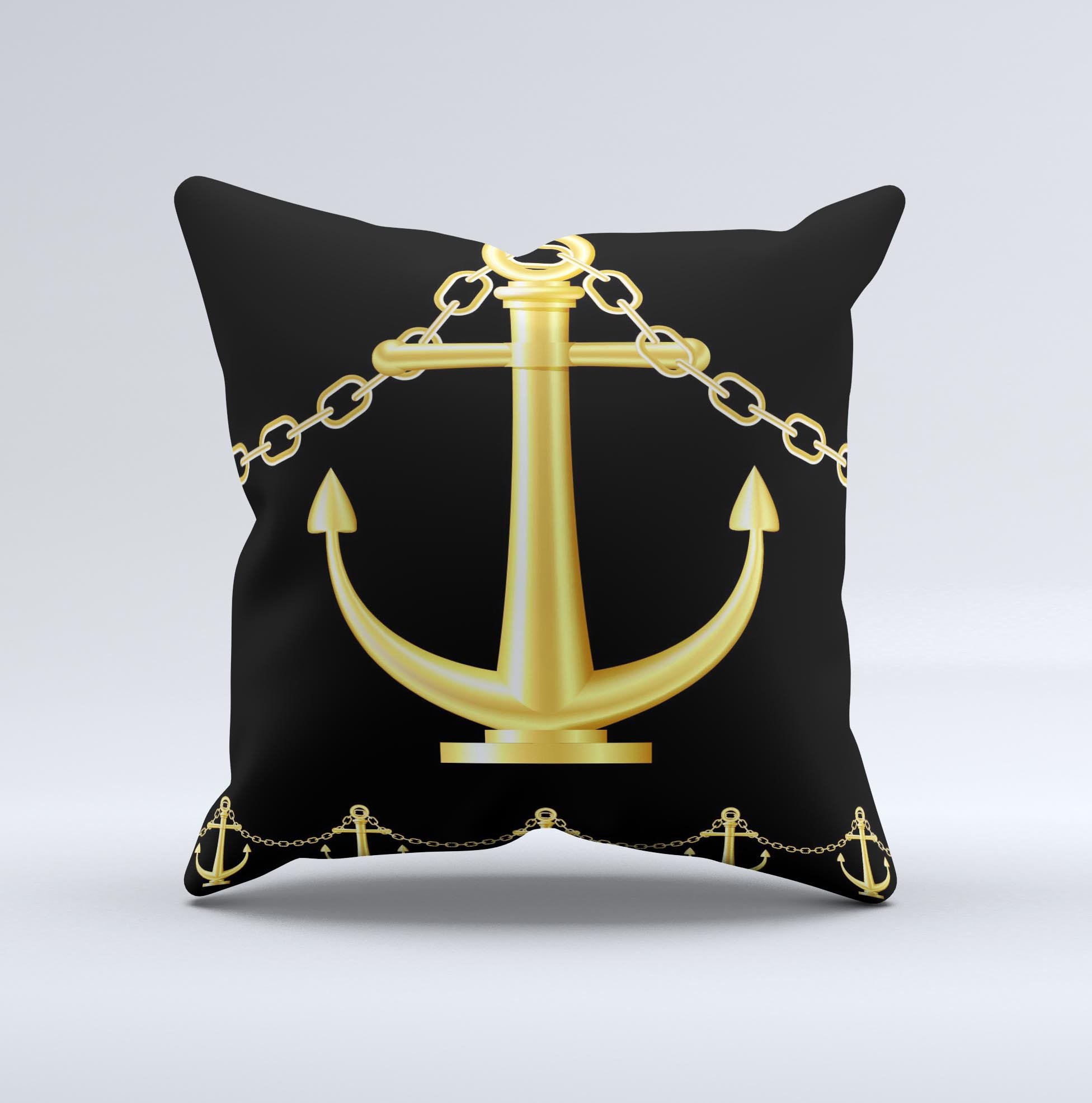 Black cushion with gold anchor.