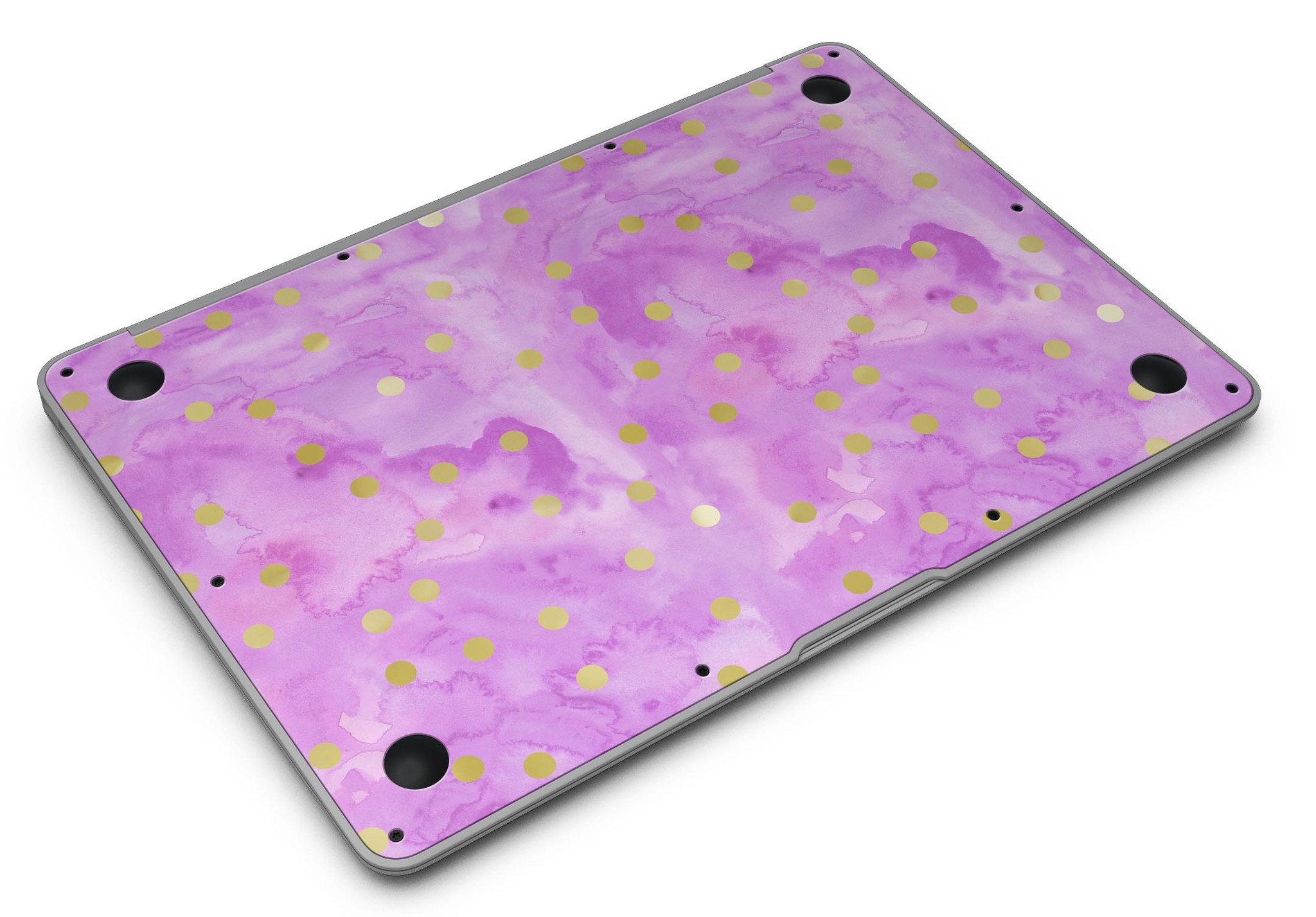 Gold polka dots design on a grungy pink surface MacBook Air skin, showcasing stylish protection.