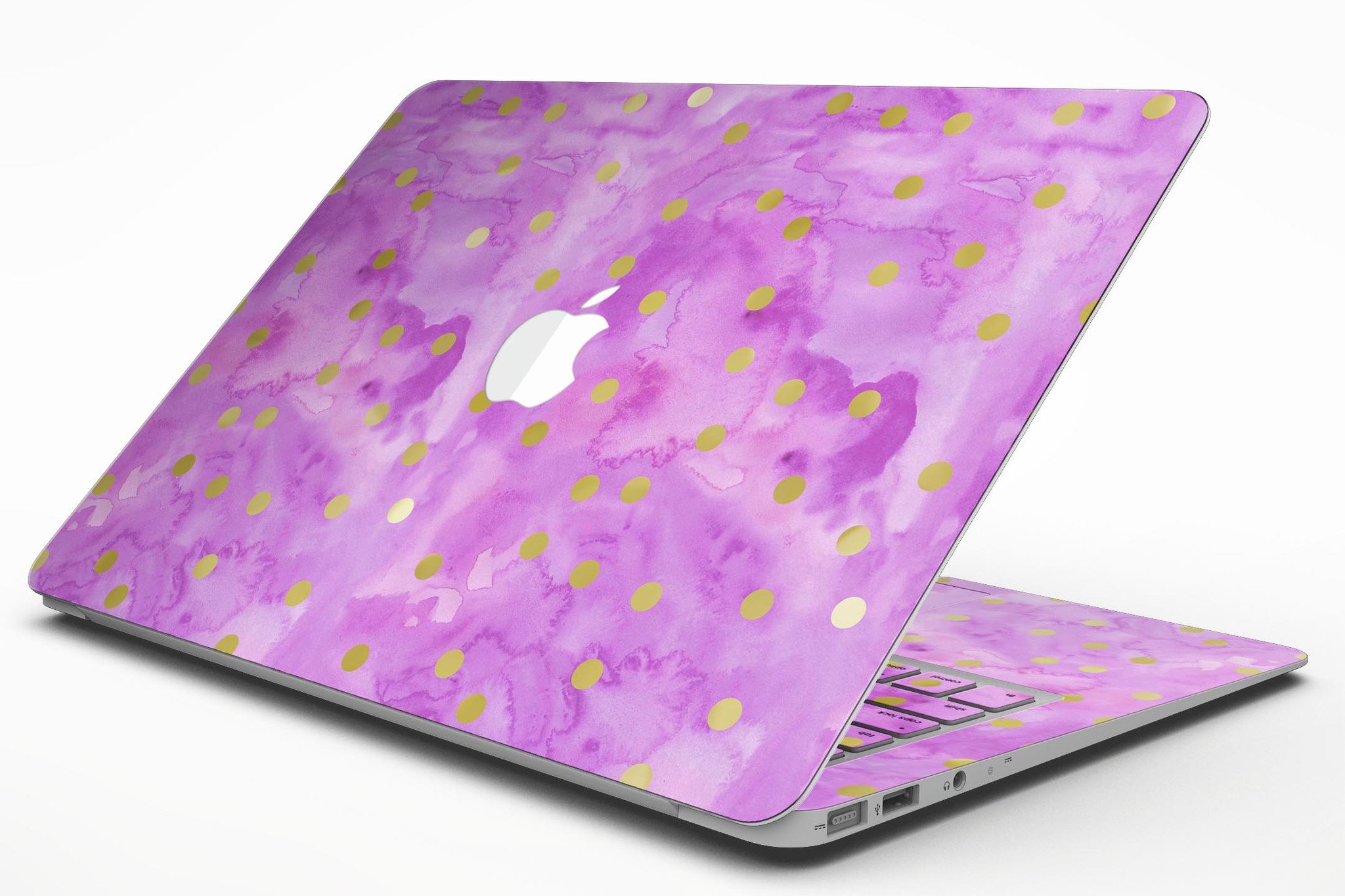Gold polka dots design on a grungy pink surface MacBook Air skin, showcasing stylish protection.