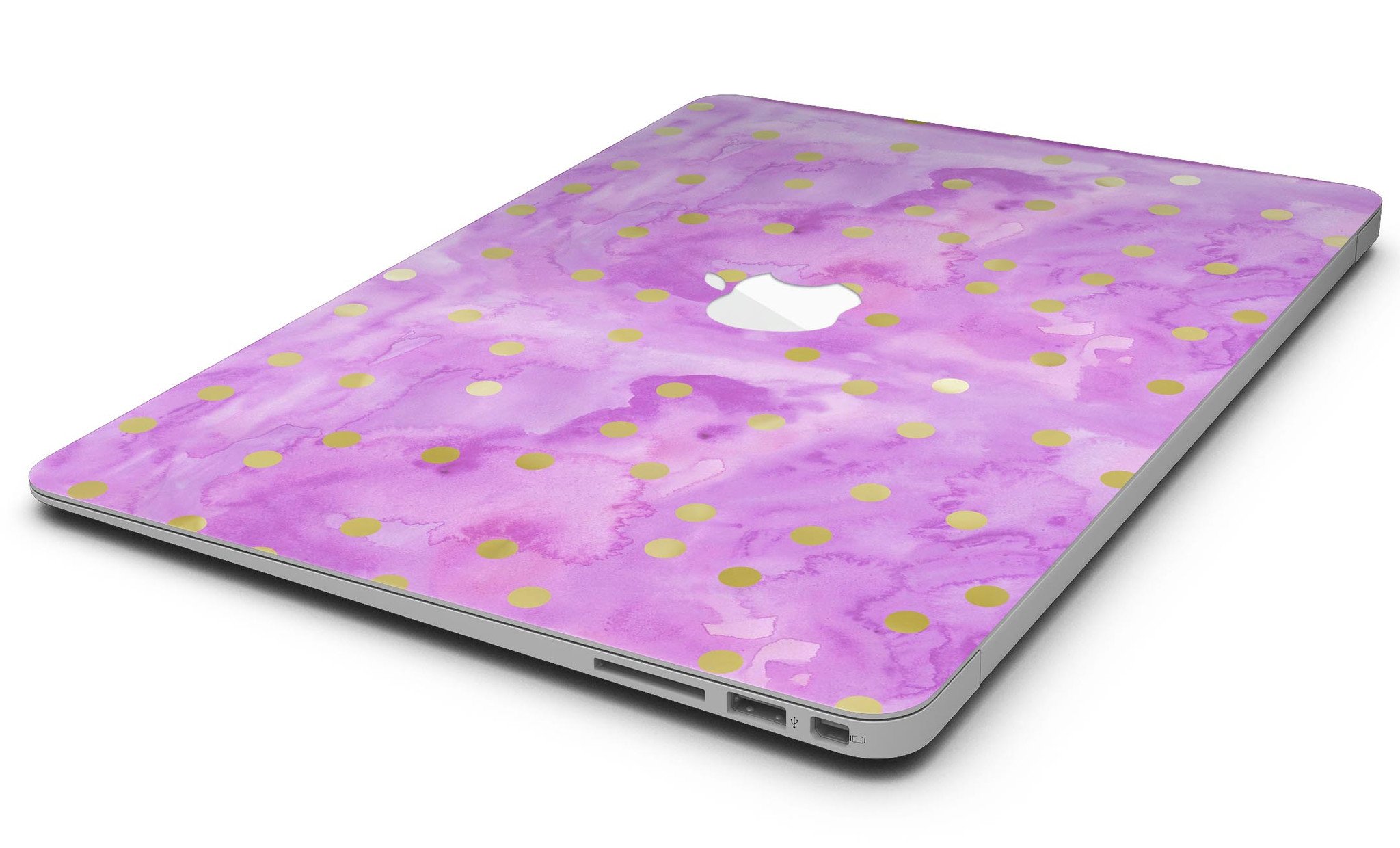 Gold polka dots design on a grungy pink surface MacBook Air skin, showcasing stylish protection.