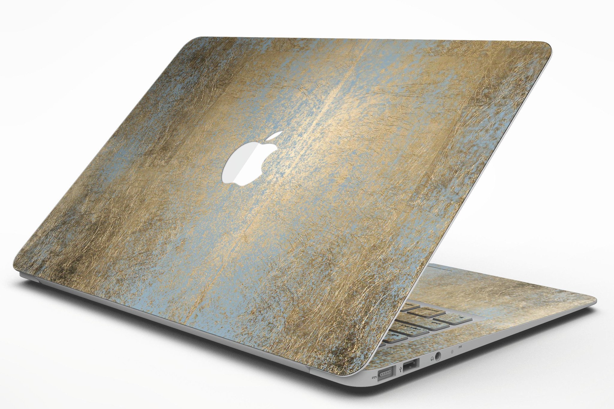 Gold Scratched Foil skin kit for MacBook Air, showcasing a stylish design that protects the device from scratches.