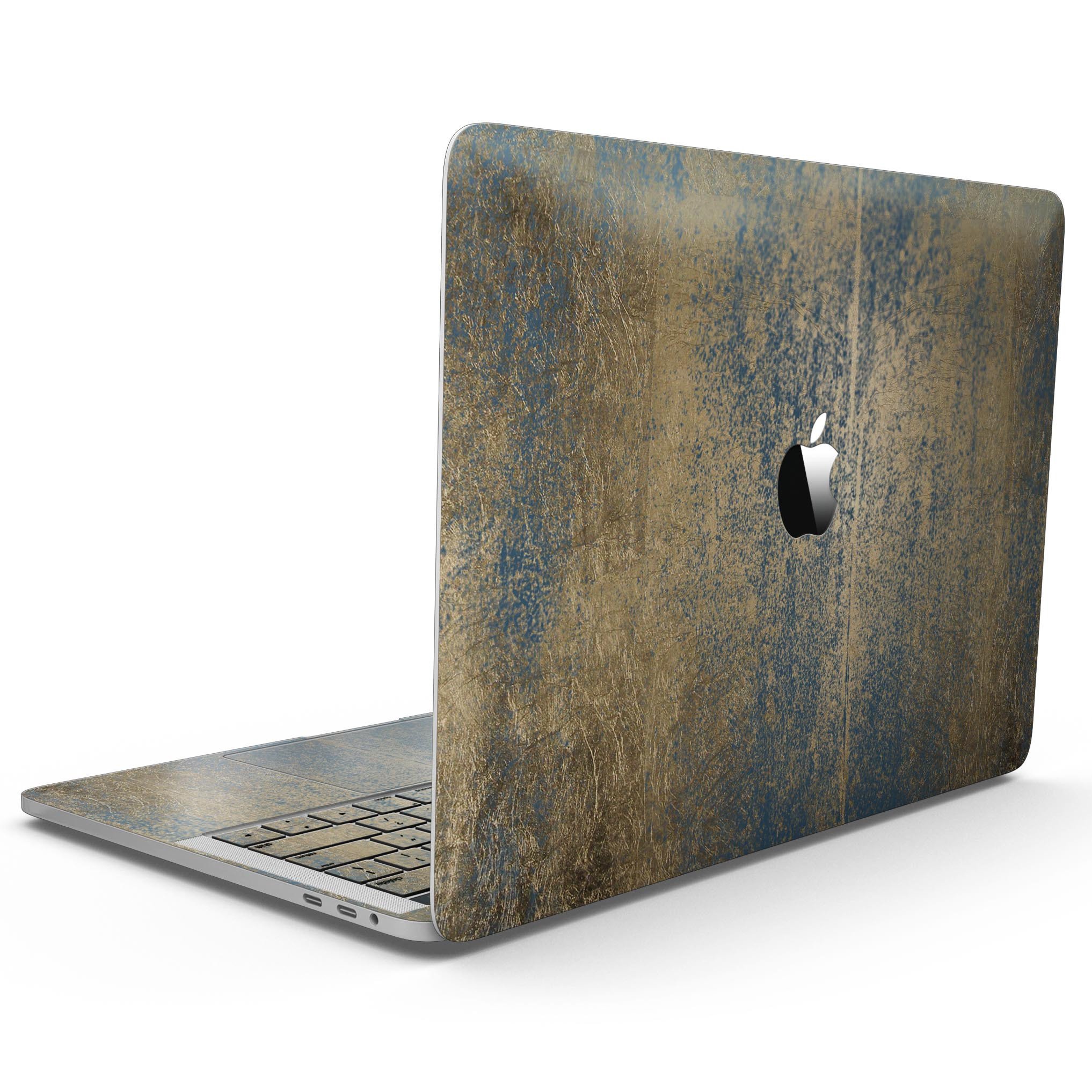 Gold Scratched Foil skin kit for MacBook Pro with Touch Bar, showcasing a stylish design that protects against scratches.