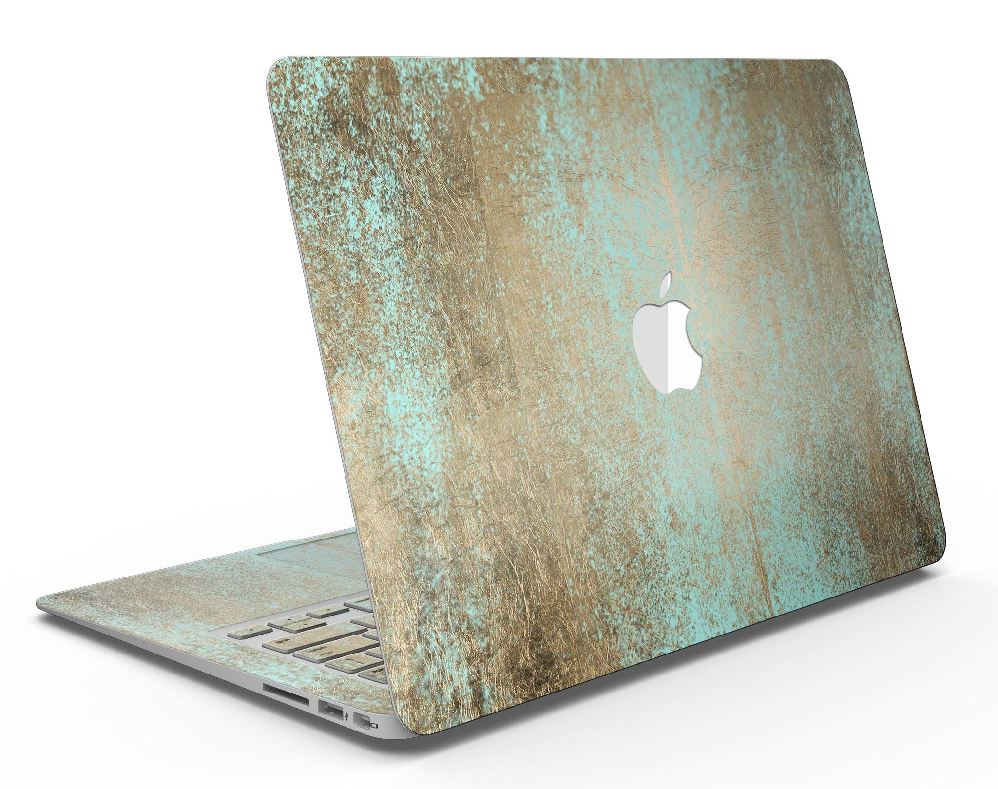 Gold Scratched Foil skin applied to a MacBook Air, showcasing its stylish design and premium finish.