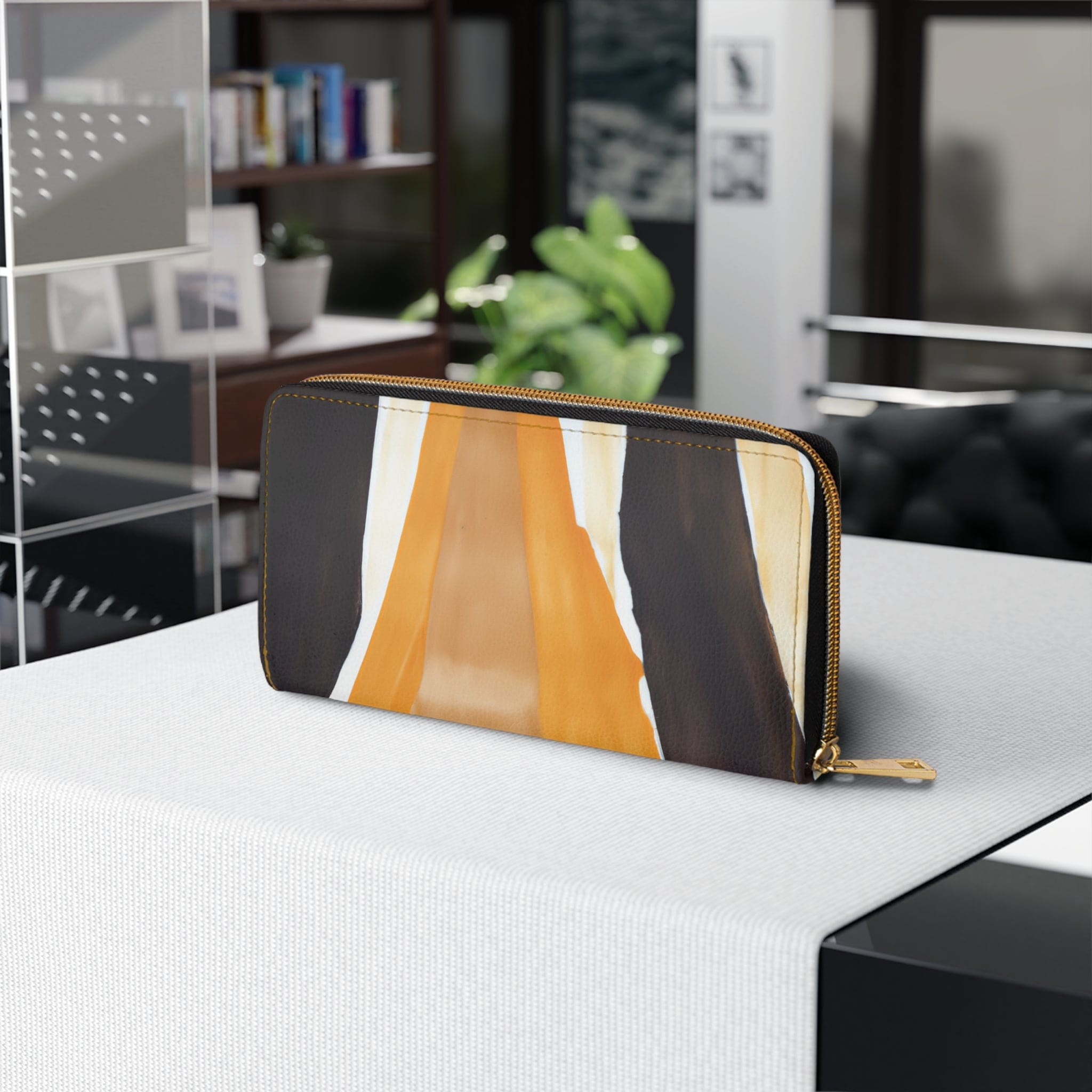 Golden yellow and brown abstract pattern women's zipper wallet clutch purse with multiple compartments and durable zipper.