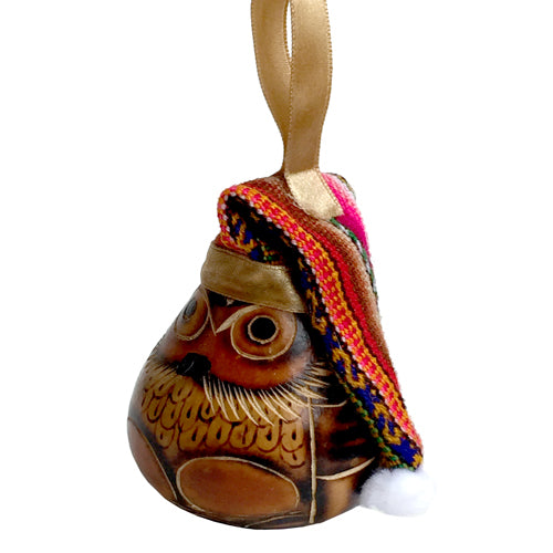 Hand-carved gourd owl ornament wearing a hat, showcasing intricate designs and craftsmanship from Peru.