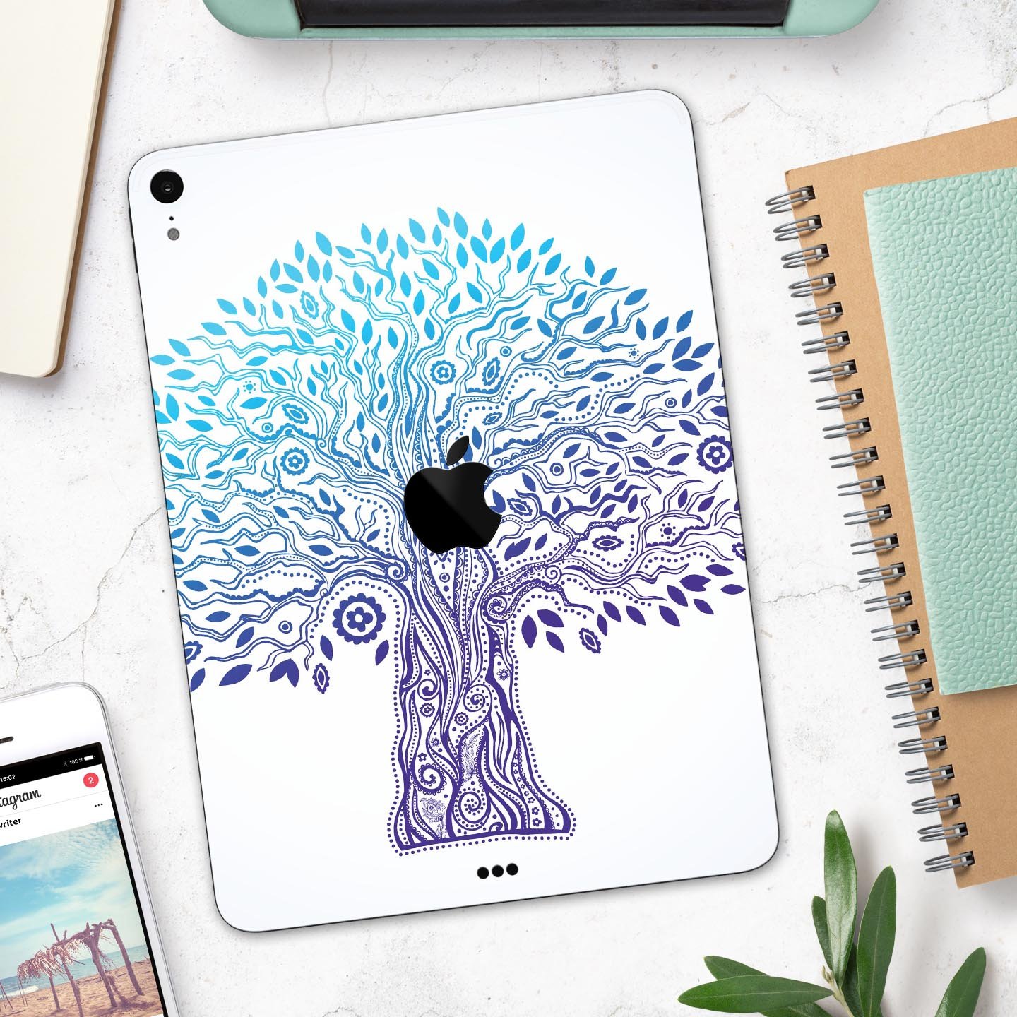 Gradiated Tree of Life skin decal for Apple iPad Pro, showcasing vibrant colors and intricate design on a sleek device.