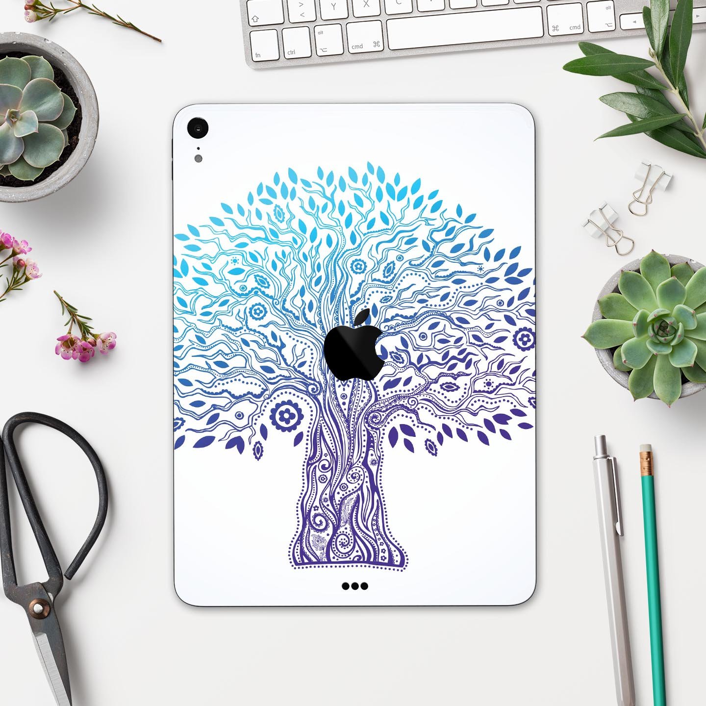 Gradiated Tree of Life skin decal for Apple iPad Pro, showcasing vibrant colors and intricate design on a sleek device.