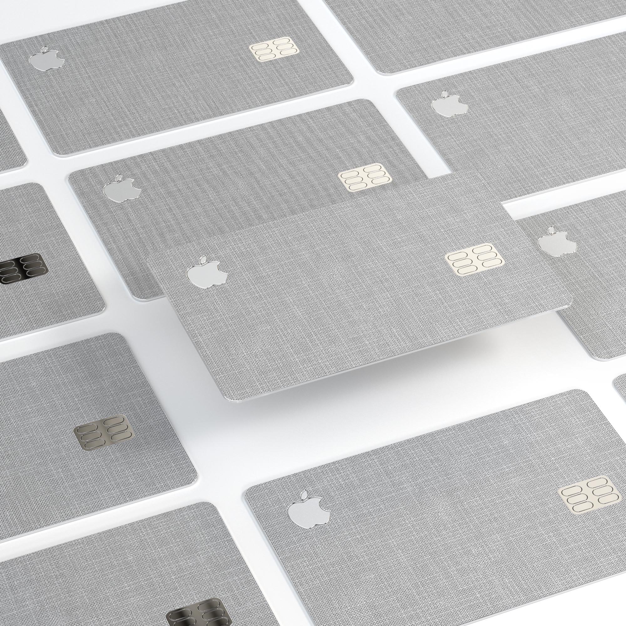 Gray and white scratched fabric skin decal for Apple Card, showcasing premium vinyl material and stylish design.