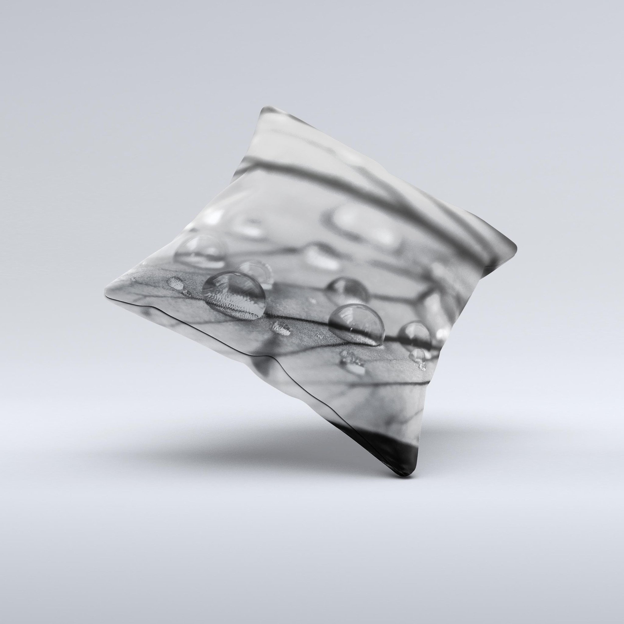 Grayscale Watered Leaf ink-Fuzed Decorative Throw Pillow showcasing a unique hand-produced design with soft fabric.