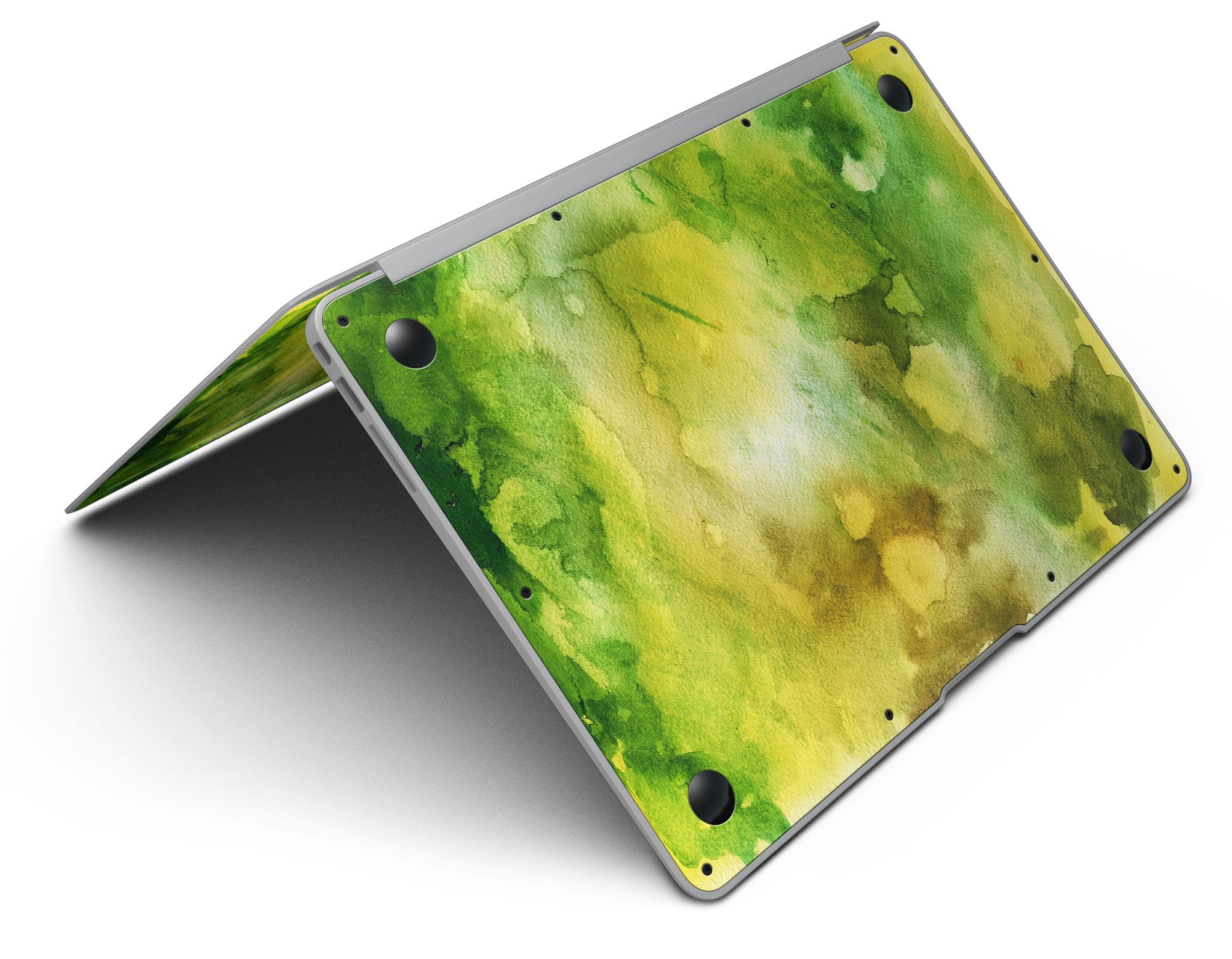Green 863 Absorbed Watercolor Texture skin applied to a MacBook Air, showcasing vibrant colors and smooth finish.