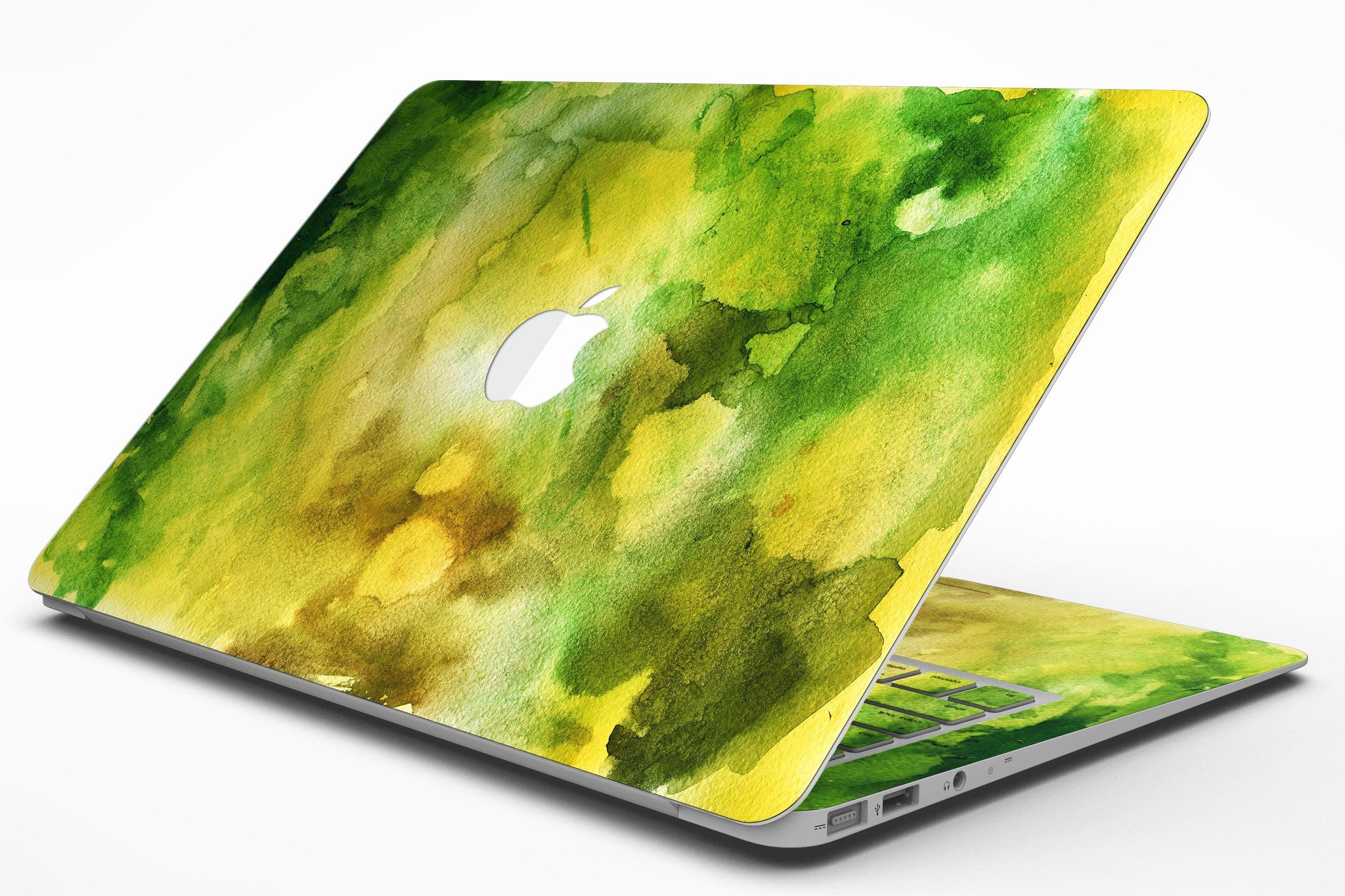 Green 863 Absorbed Watercolor Texture skin applied to a MacBook Air, showcasing vibrant colors and smooth finish.