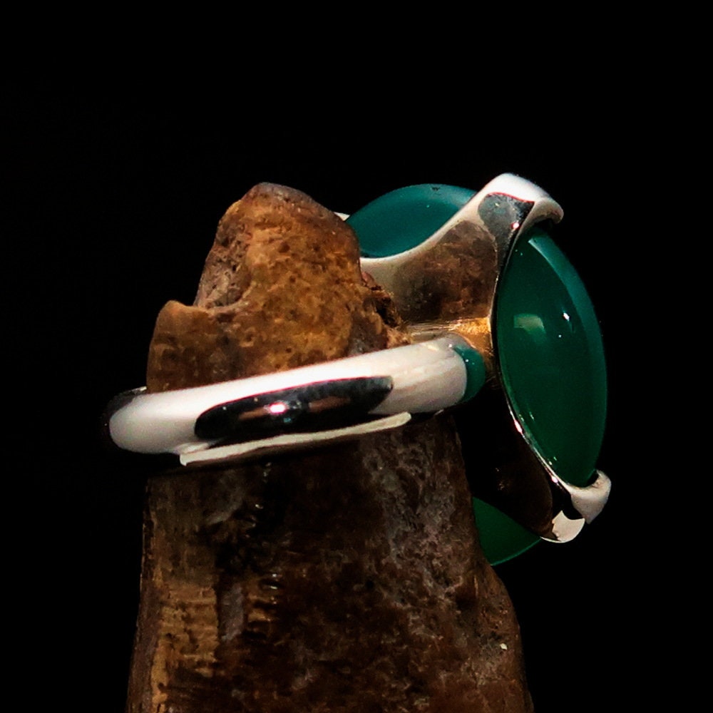 Minimalist Green Agate Ring featuring a round cabochon set in a handmade sterling silver band, showcasing elegance and simplicity.