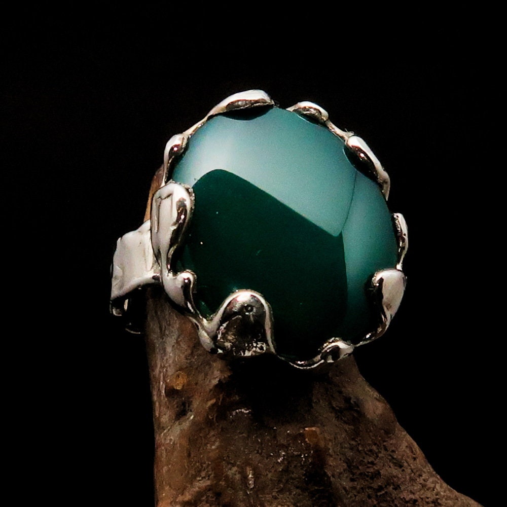Elegant Green Agate Ring set in polished sterling silver, featuring an oval-shaped cabochon and intricate band detailing.