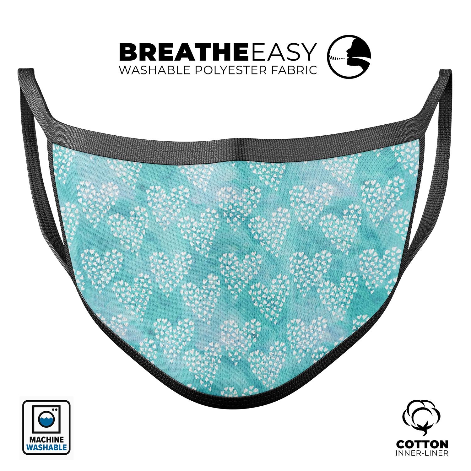 Green and white watercolor hearts pattern mouth cover, showcasing a stylish design with adjustable ear loops.