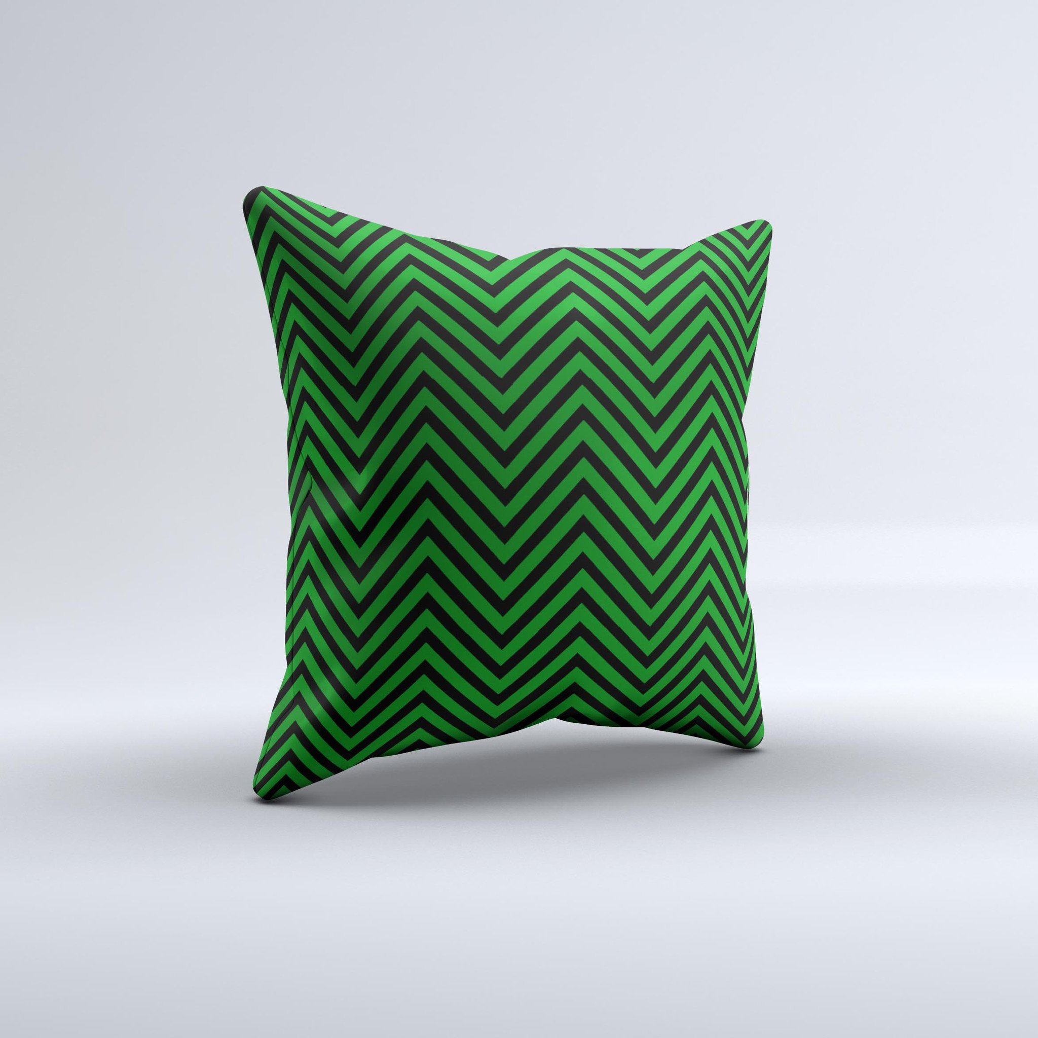 Green and black decorative throw pillow featuring a sharp chevron pattern, handcrafted in Virginia with high-quality materials.