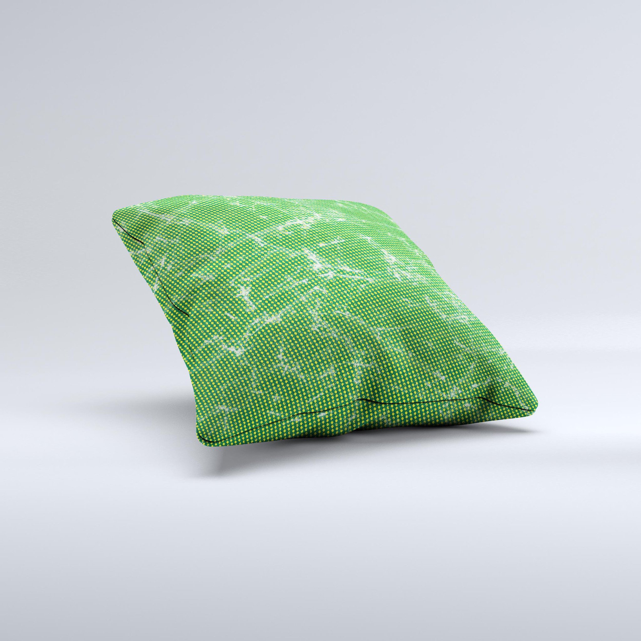 Green and yellow decorative throw pillow with mesh ink-fuzed design, handcrafted in Virginia, showcasing unique patterns and high-quality fabric.