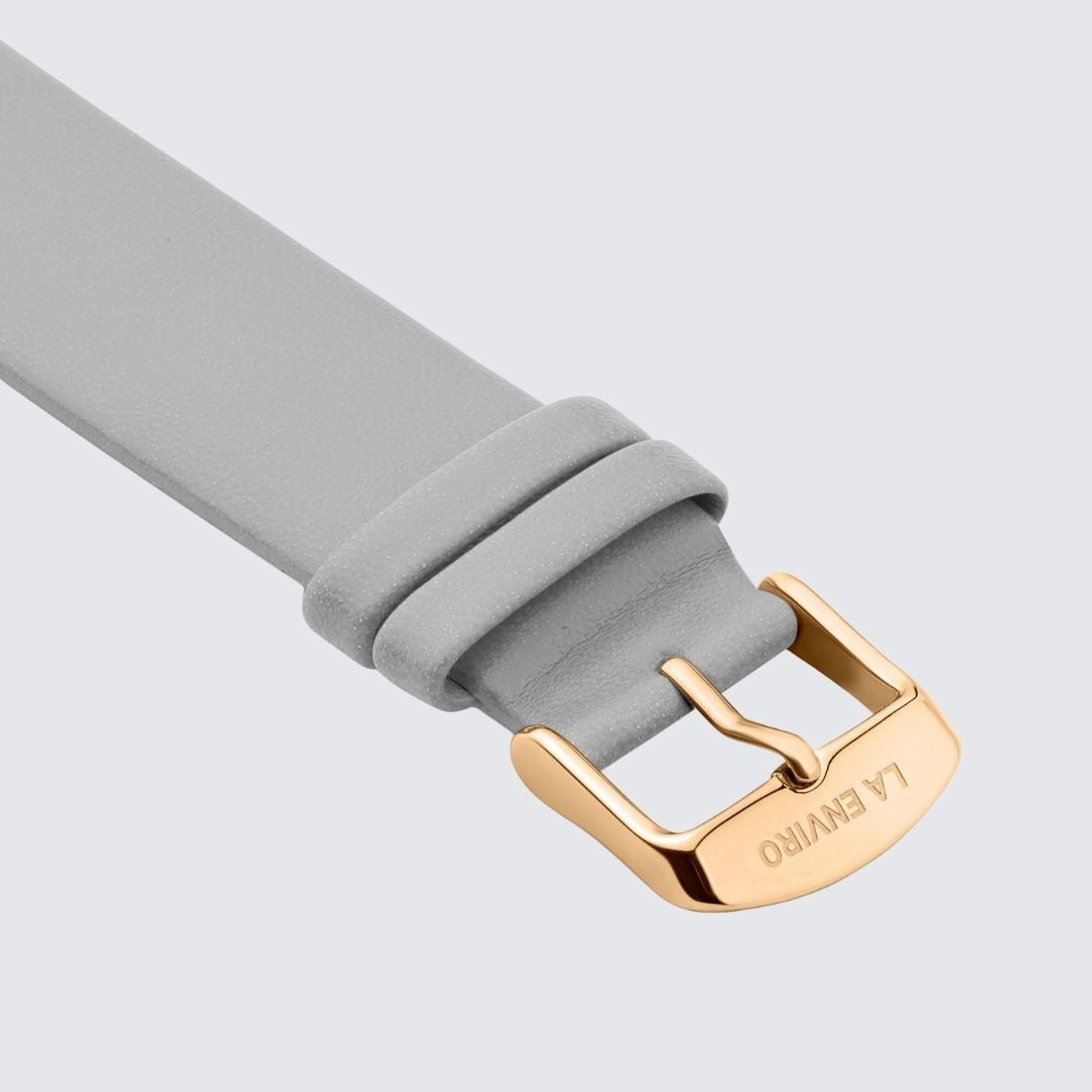 GREY Unstitched Strap made of vegan leather, featuring a 20MM width and stainless steel buckle options in rose gold, black, gold, and silver.