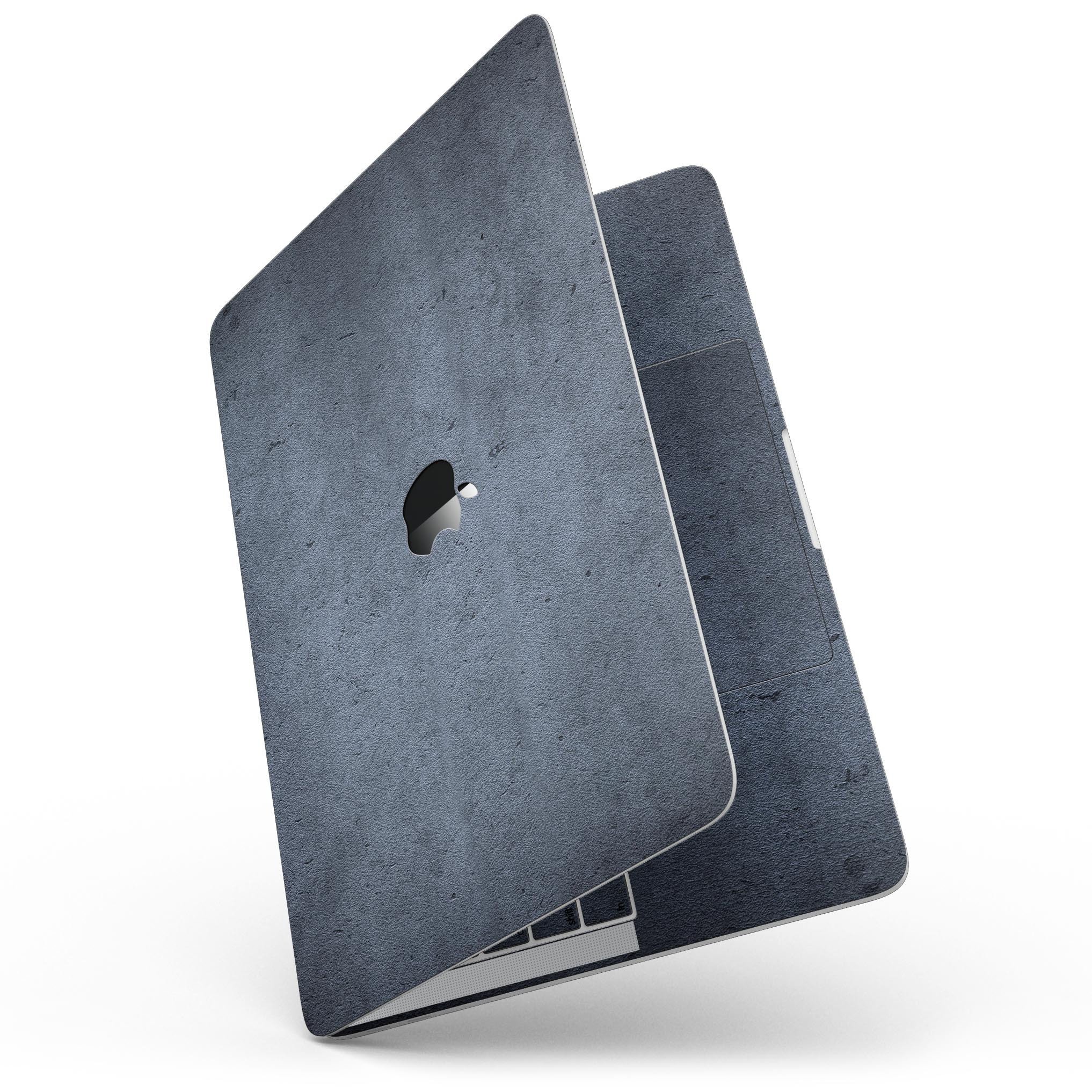 Grunge Blue Concrete Surface skin applied to a MacBook Pro with Touch Bar, showcasing its stylish design and precise fit.
