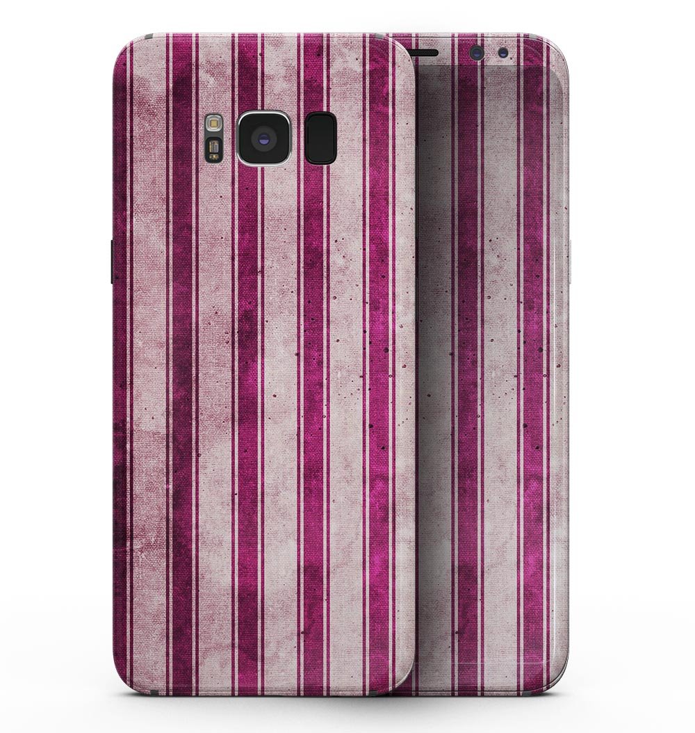 Samsung Galaxy S8 with Grungy Magenta and Pink Vertical Stripes skin, showcasing vibrant colors and stylish design.