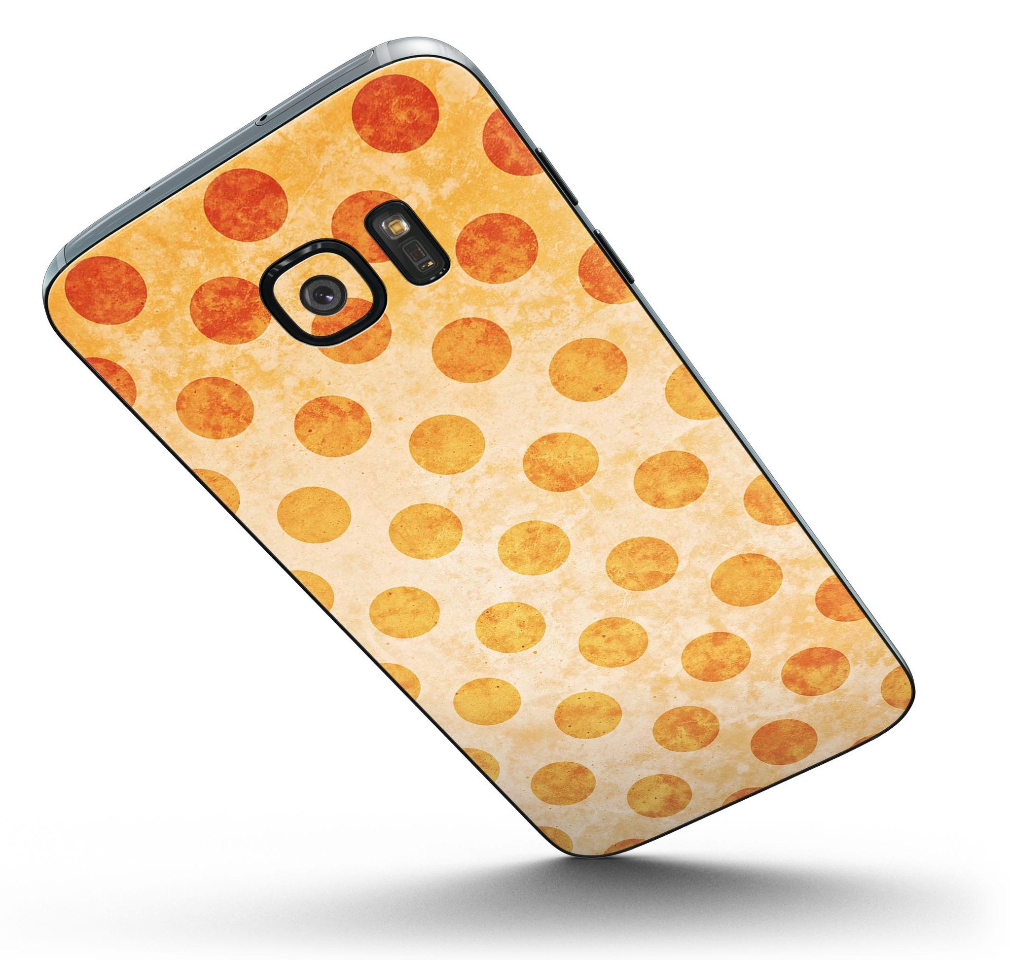Grungy orange polka dots skin kit for Samsung Galaxy S7 and S7 Edge, showcasing vibrant design over muted coral background.