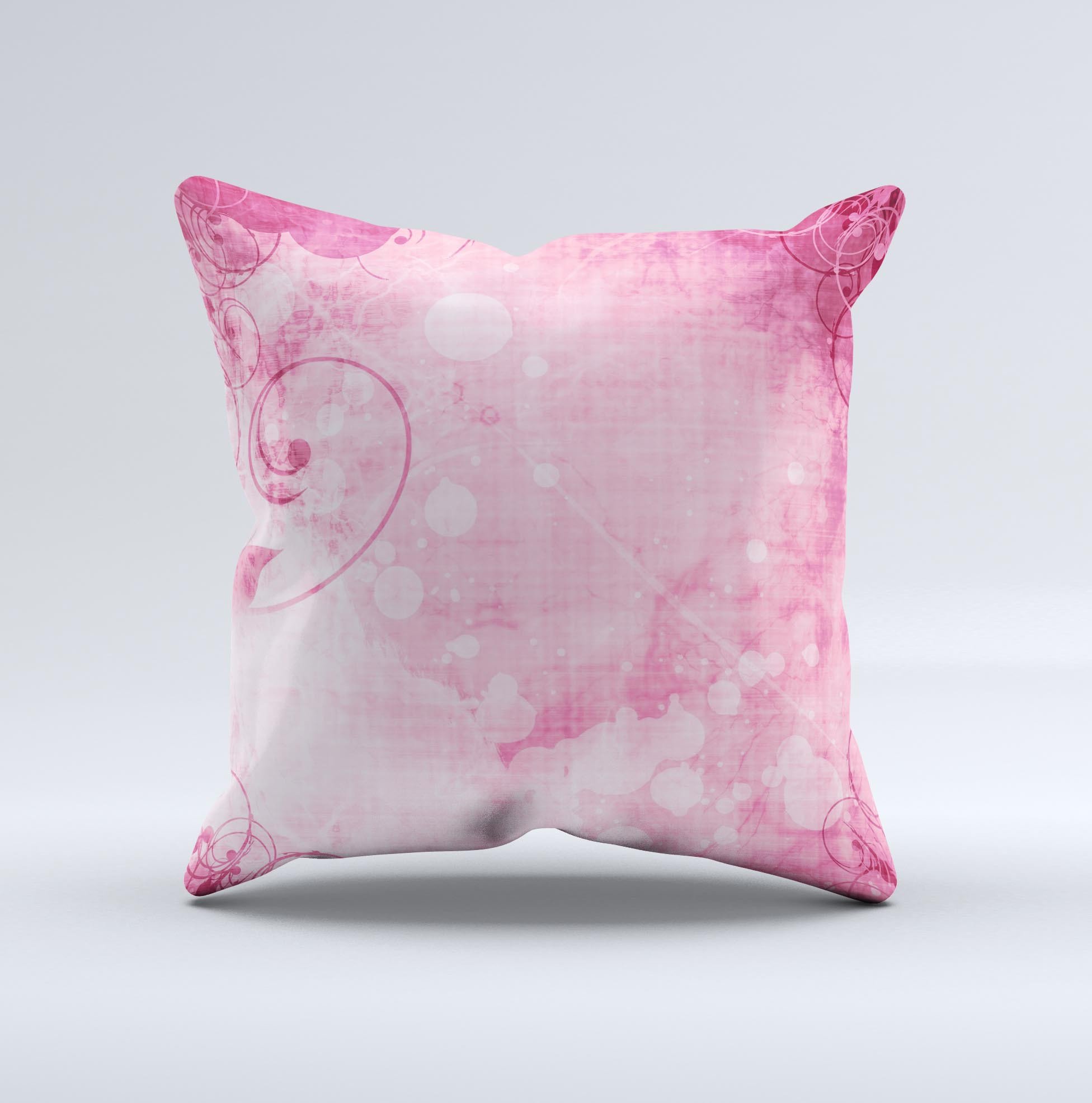 A handcrafted decorative throw pillow featuring a grungy pink painted swirl pattern, showcasing unique design and high-quality fabric.